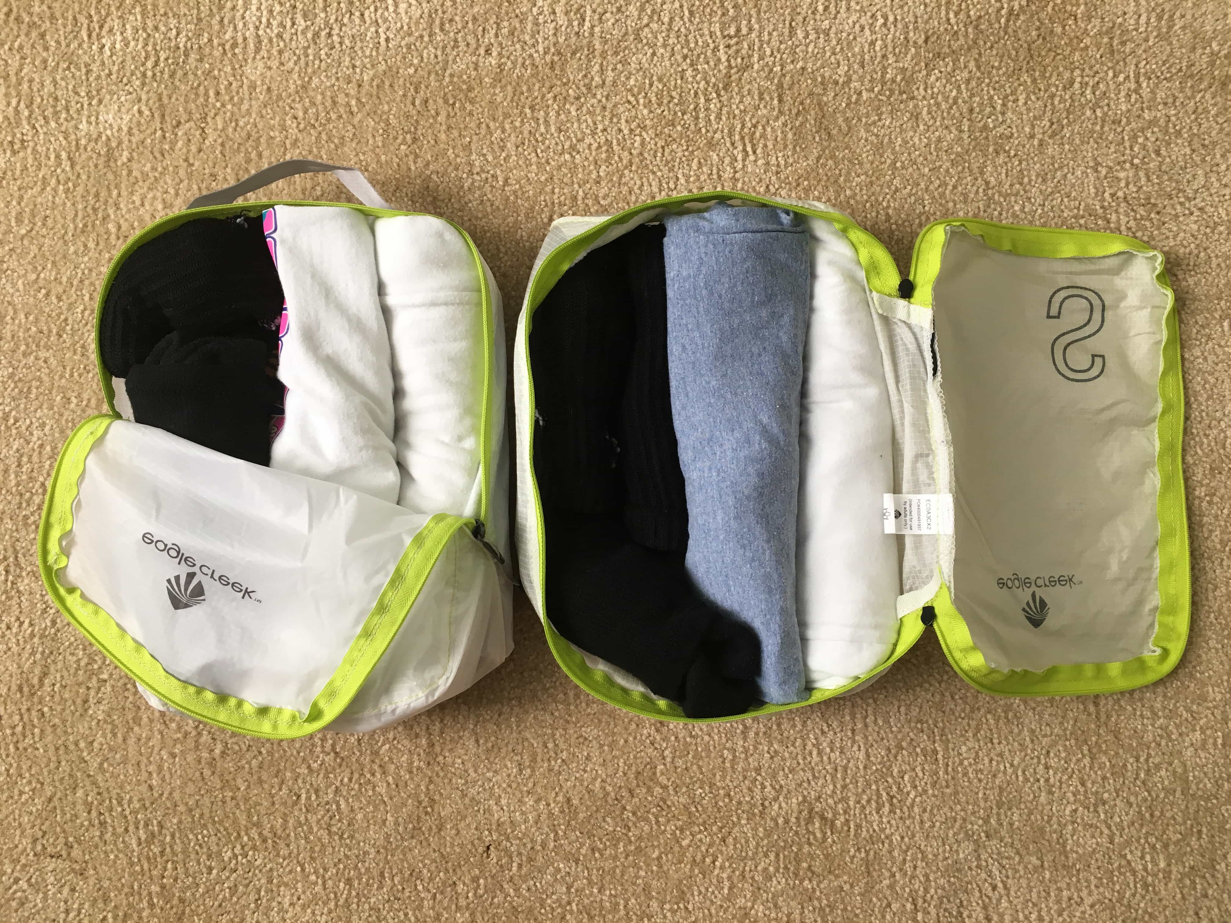 Eagle Creek Specter half zip (left) compared to Specter Tech full zip (right)