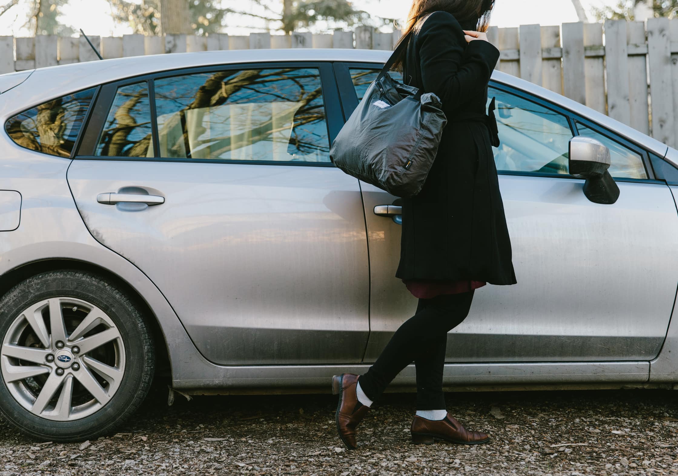 Matador Transit Tote Bag Usage by a Car