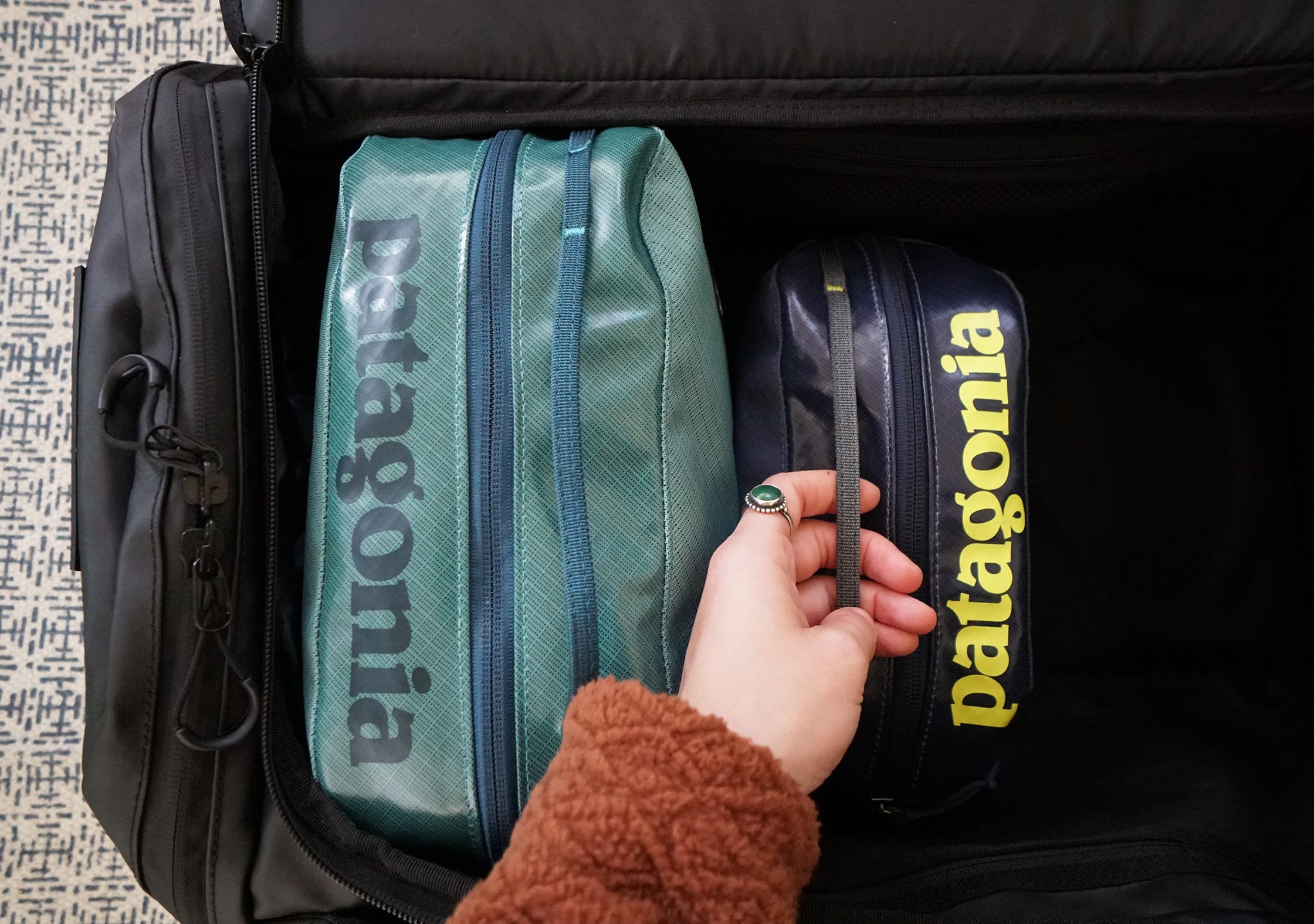 Patagonia Black Hole Cubes Packed into Travel Backpack