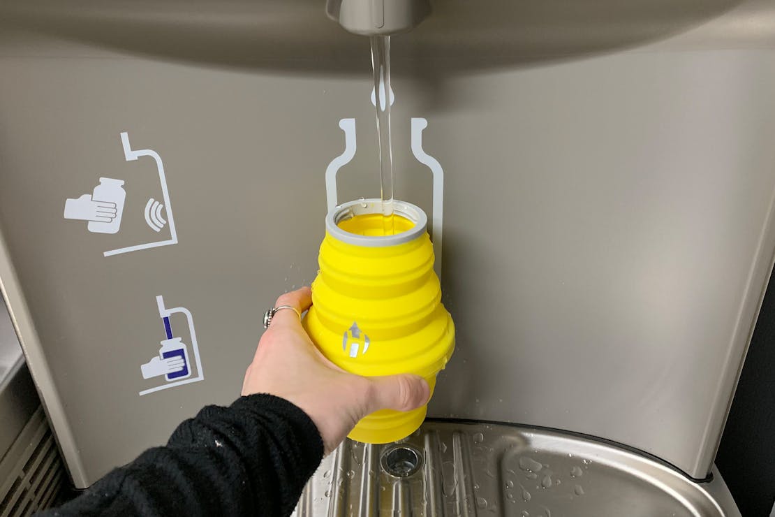 Hydaway 18oz Collapsible Water Bottle Being Filled At Water Station