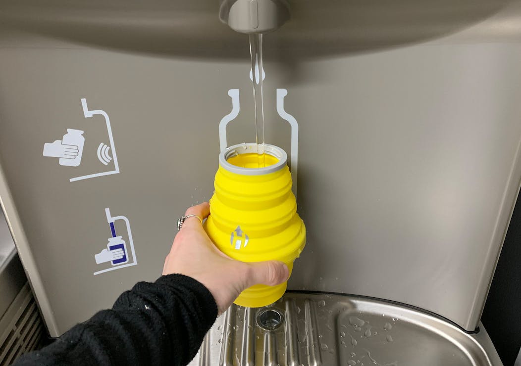 Hydaway 18oz Collapsible Water Bottle Being Filled At Water Station