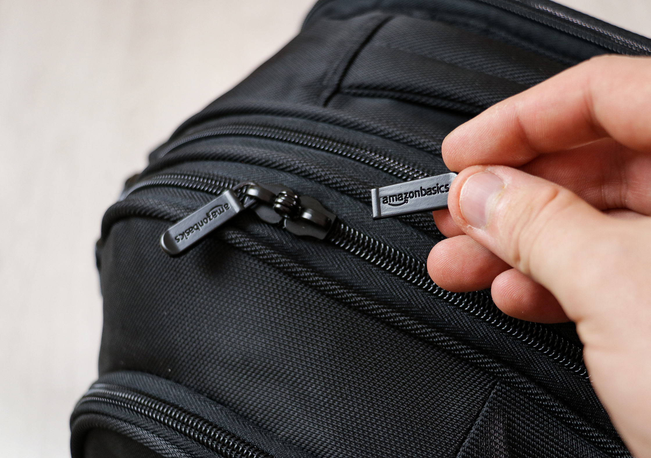 AmazonBasics Carry-On Travel Backpack Broken Zipper Pull