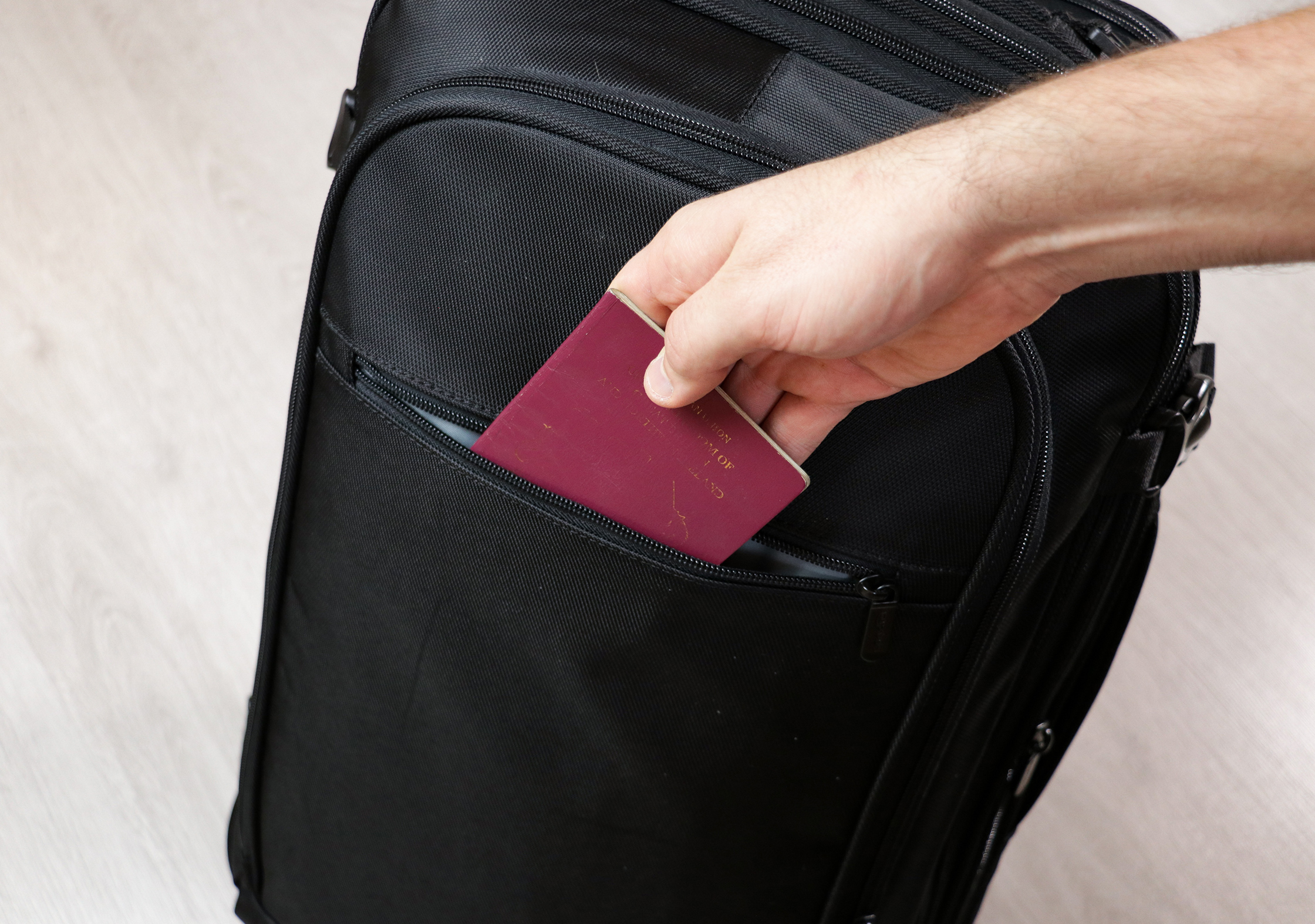 AmazonBasics Carry-On Travel Backpack Quick-Grab Pocket