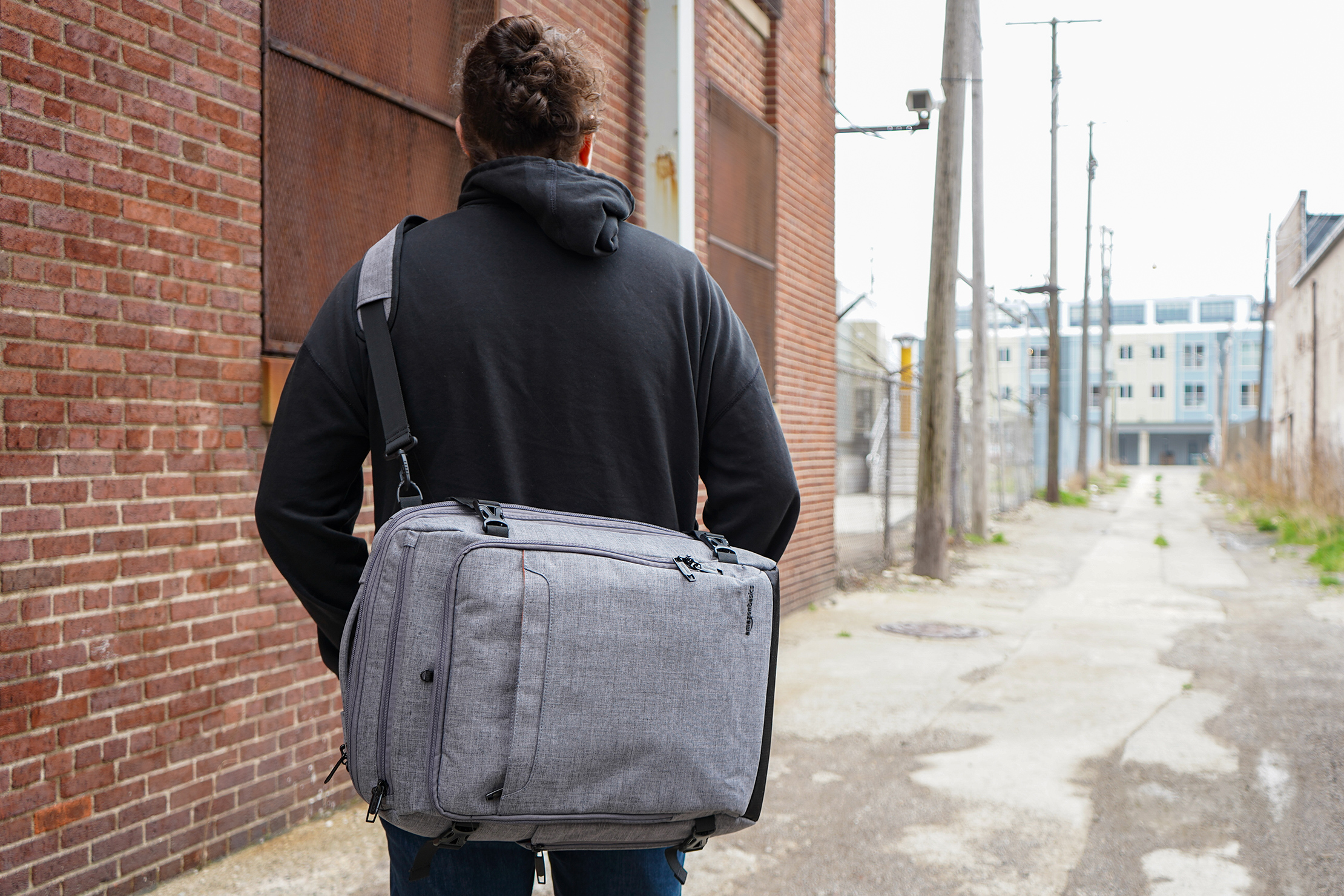 AmazonBasics Slim Travel Backpack Weekender Worn As A Messenger Bag
