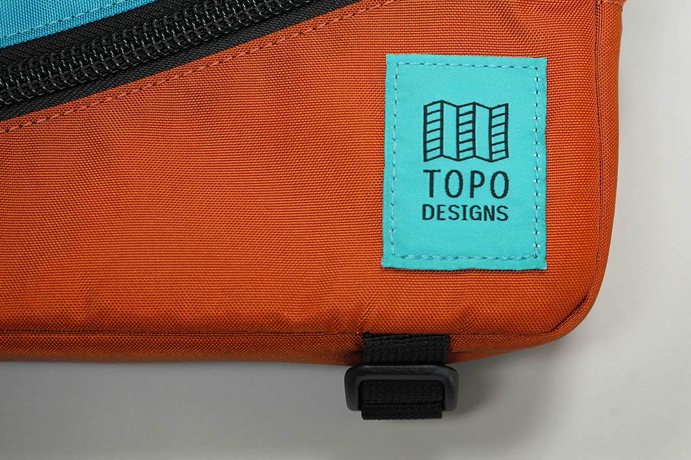 Topo Designs Mini Quick Pack Logo