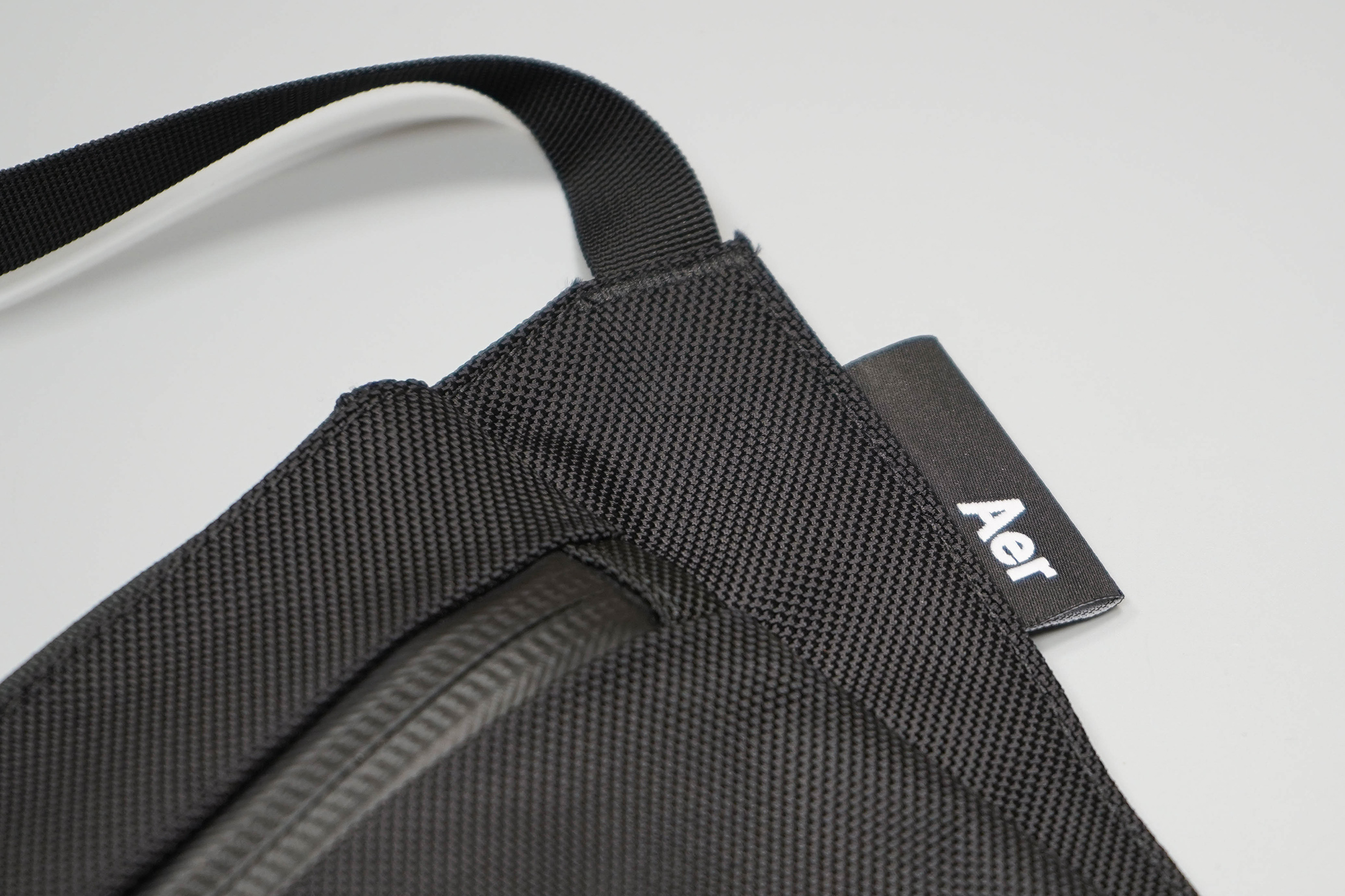 Aer Sling Pouch Logo