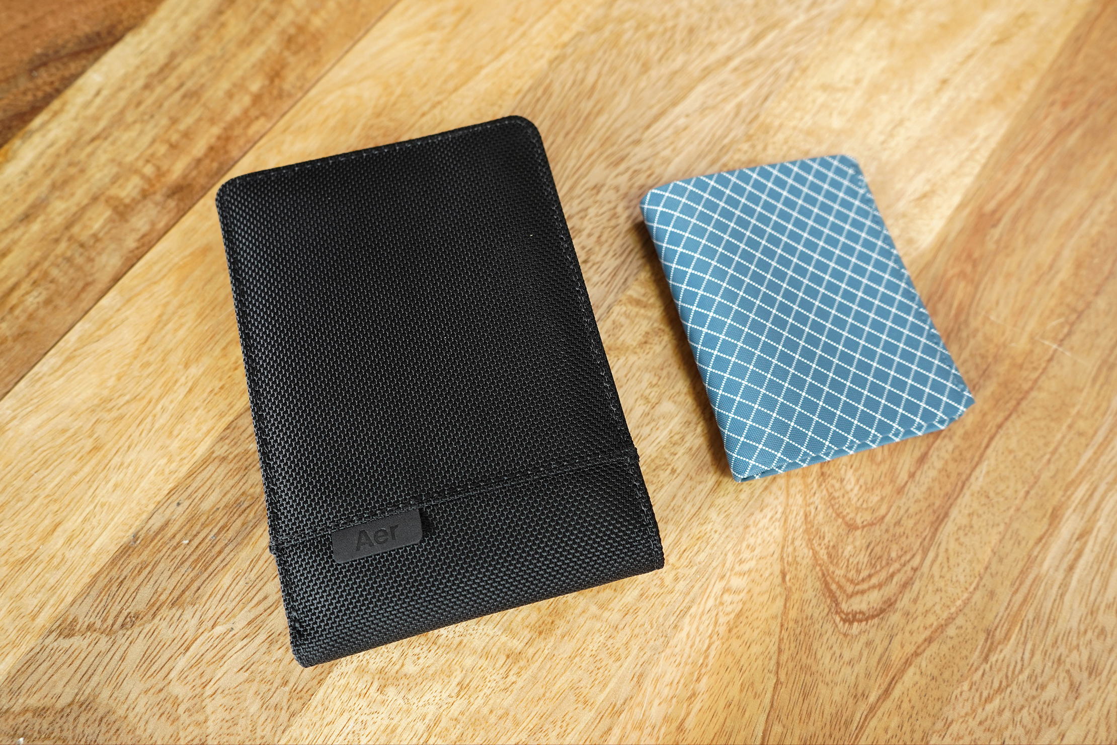 Aer Travel Wallet Size Comparison