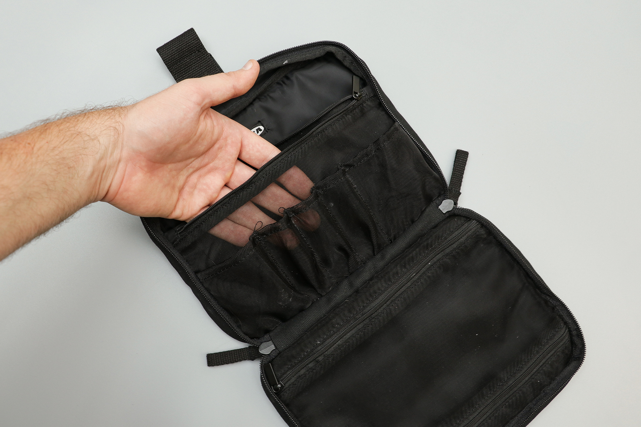 https://cdn.packhacker.com/2019/08/21575006-ikea-forfina-toiletry-bag-mesh-pocket.jpg