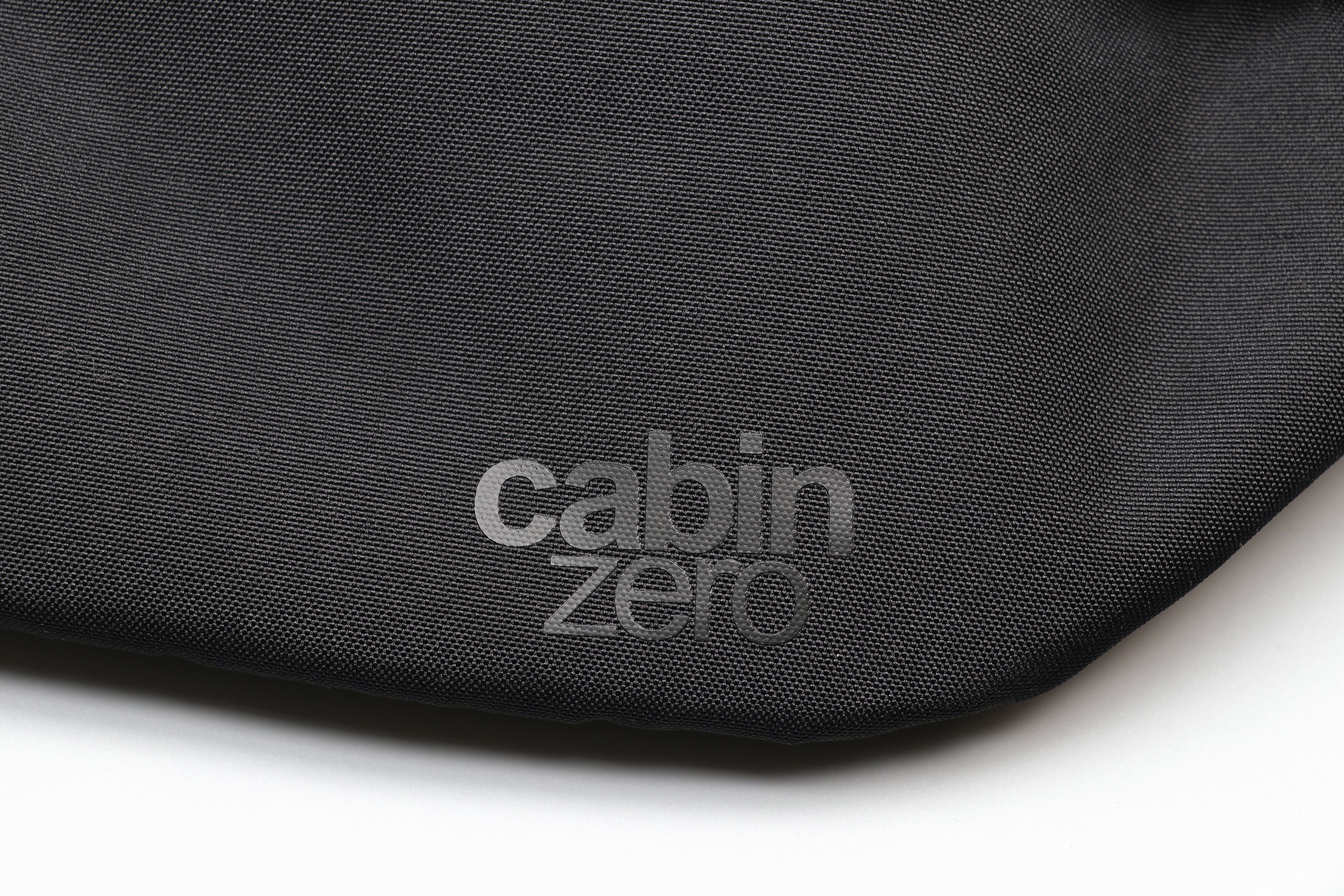 CabinZero Hip Pack 2L Logo & 600D Polyester Material