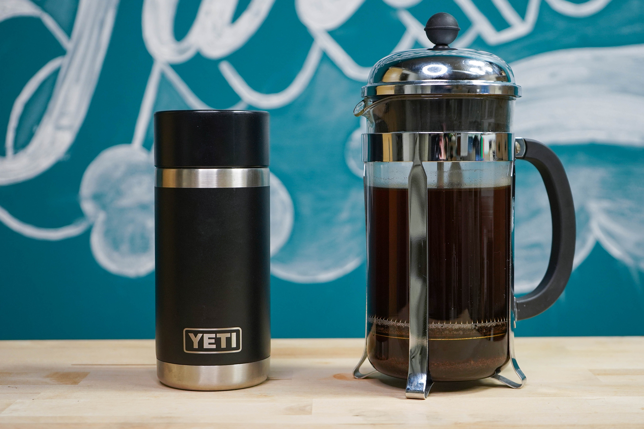 Yeti Rambler 12oz Bottle With HotShot Cap Next To French Press