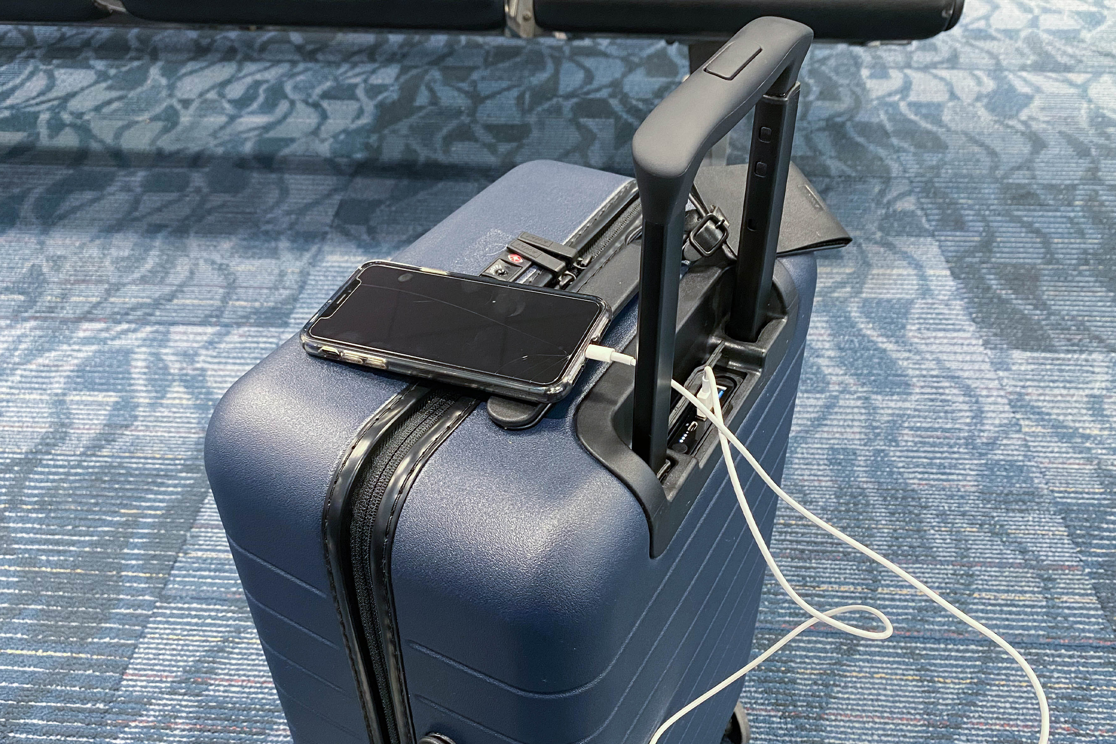 Review: the Sleek $225 Away Carry-on Suitcase Charges Your Phone and Only  Weighs 7 Pounds