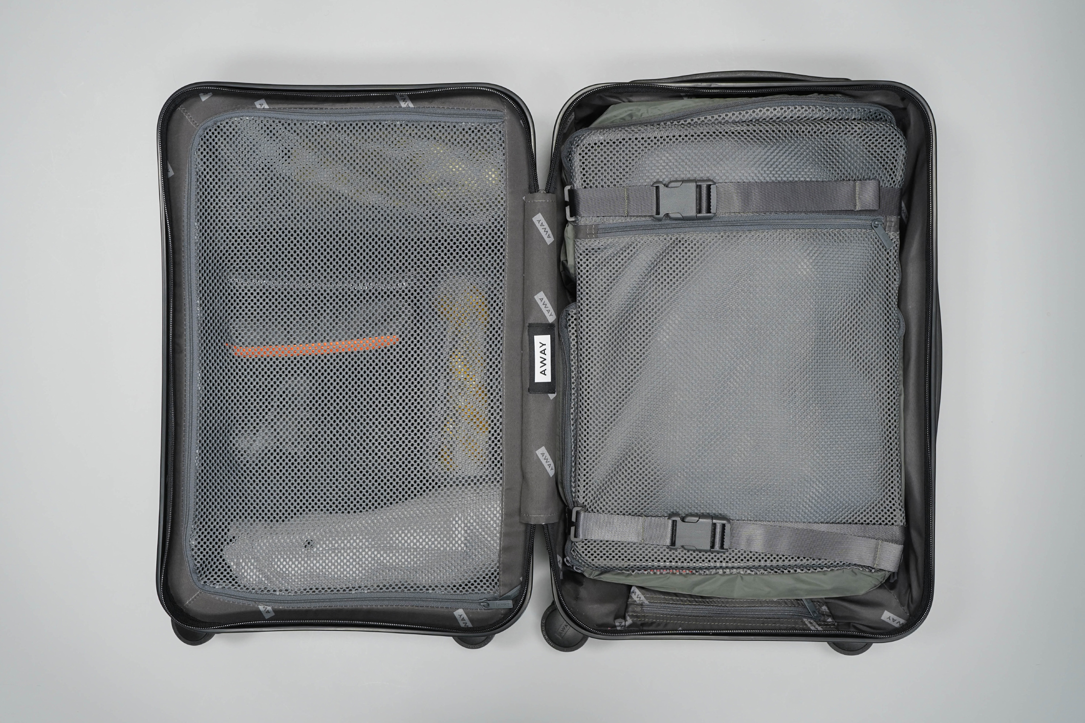 Review: the Sleek $225 Away Carry-on Suitcase Charges Your Phone and Only  Weighs 7 Pounds