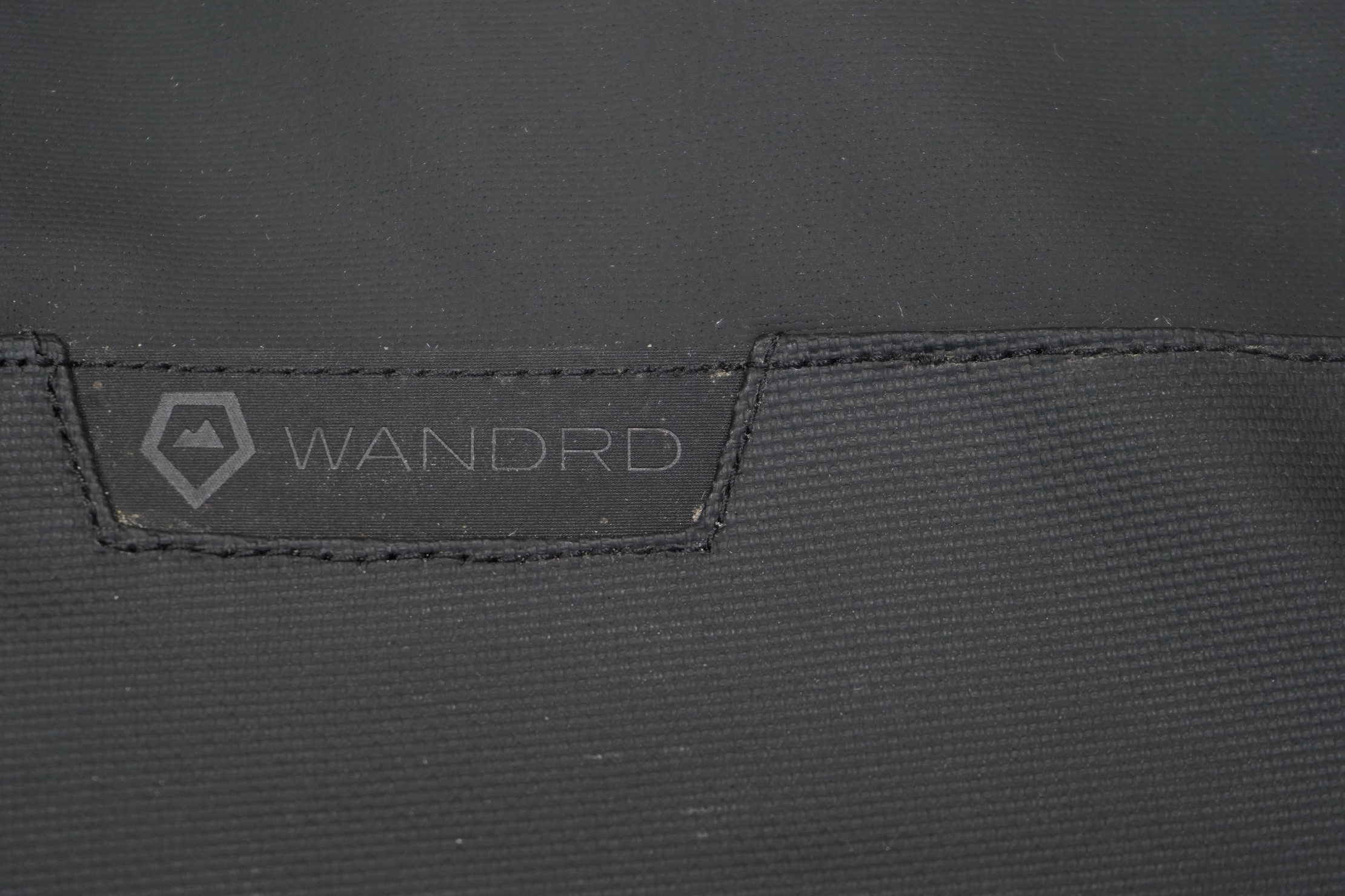 WANDRD DUO Daypack Logo