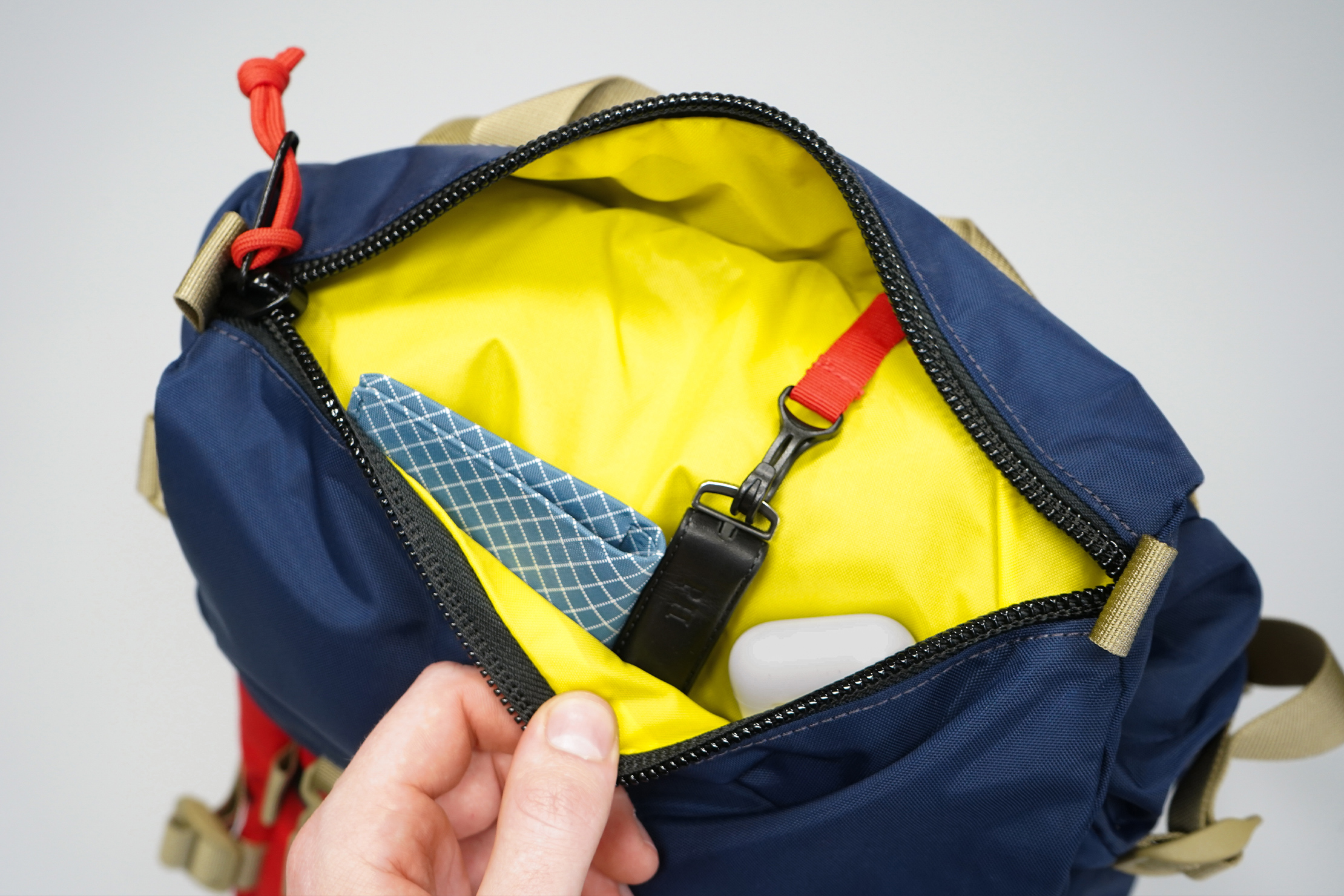 Topo Designs Rover Pack Classic | PackFast loops flank this pocket, and there’s a built-in key clip inside too