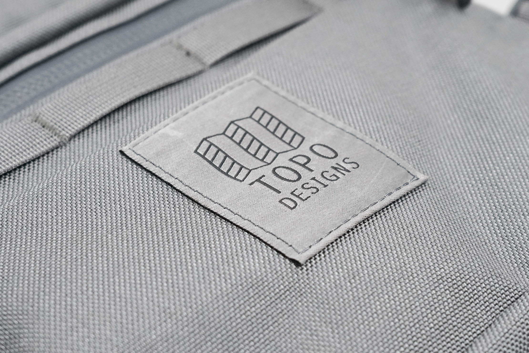 Topo Designs Rover Pack Tech Logo