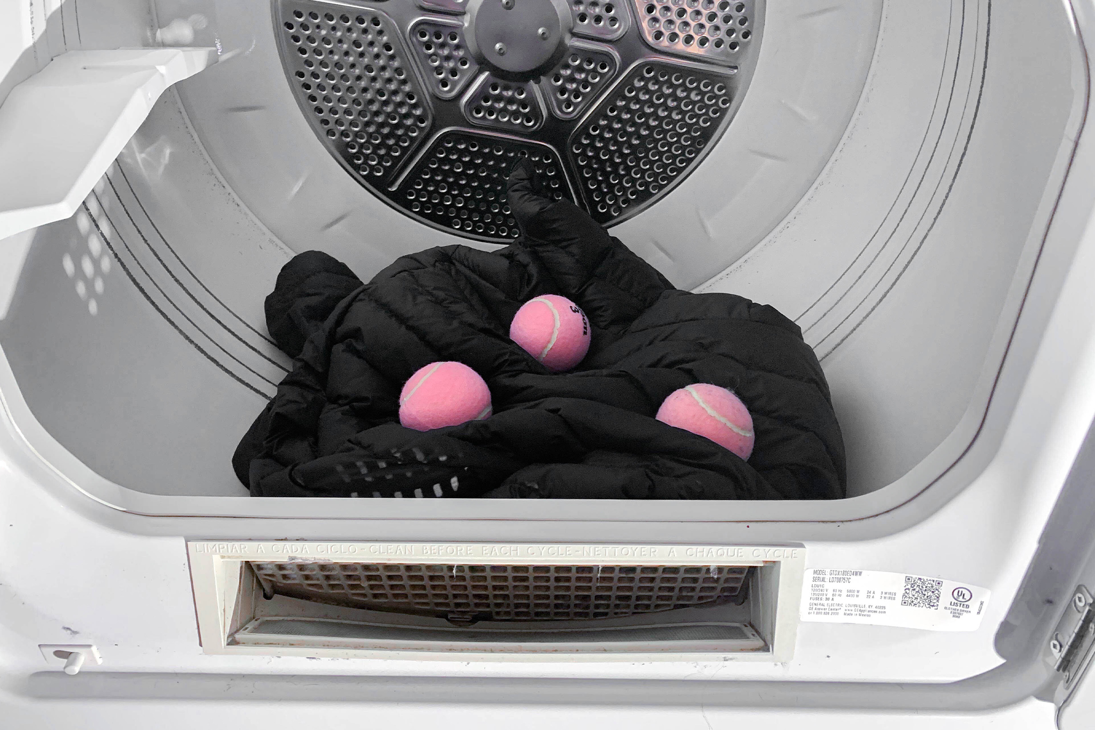Putting Jacket in Dryer with Tennis Balls