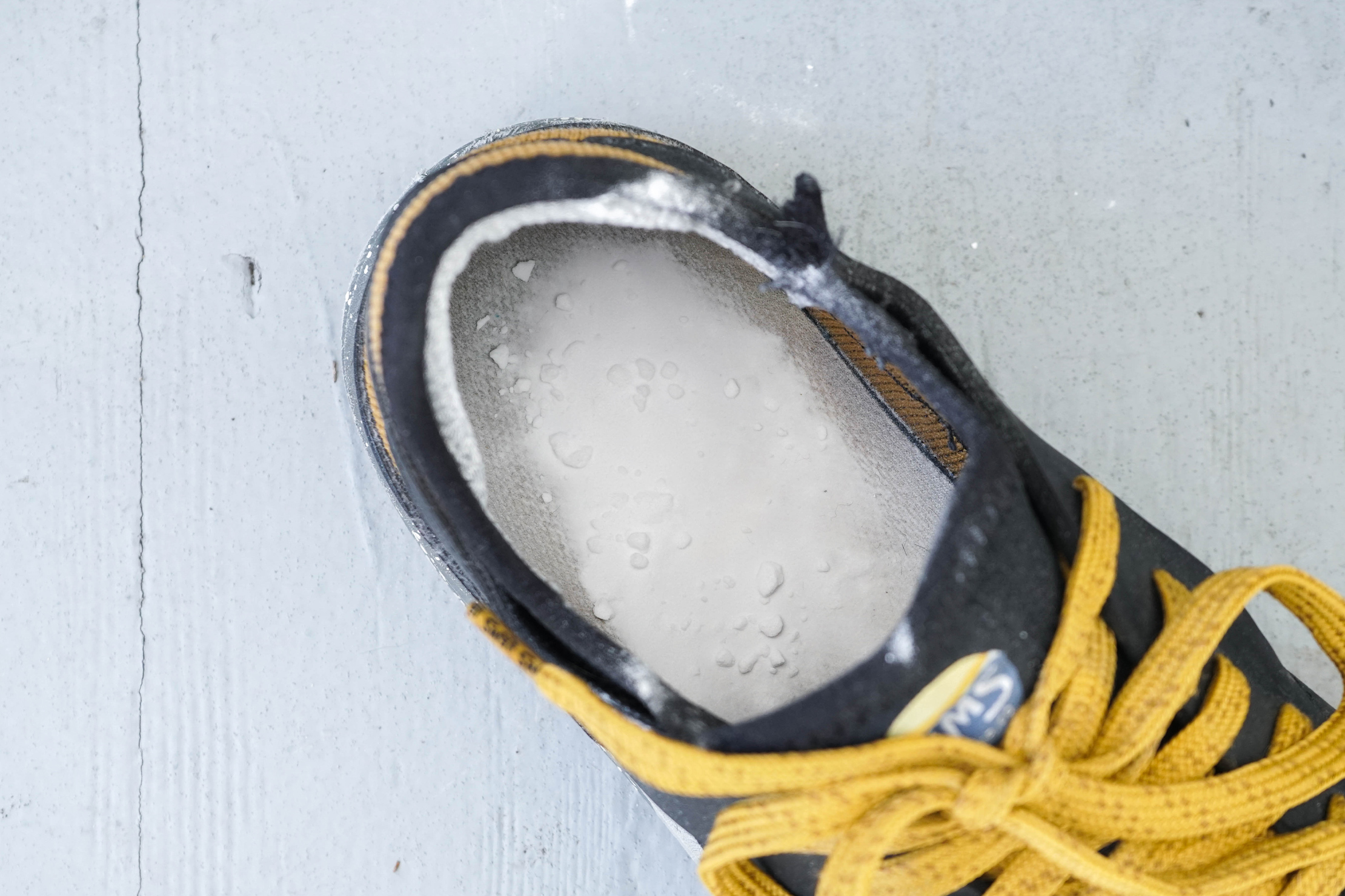 Putting Baking Soda in Shoes