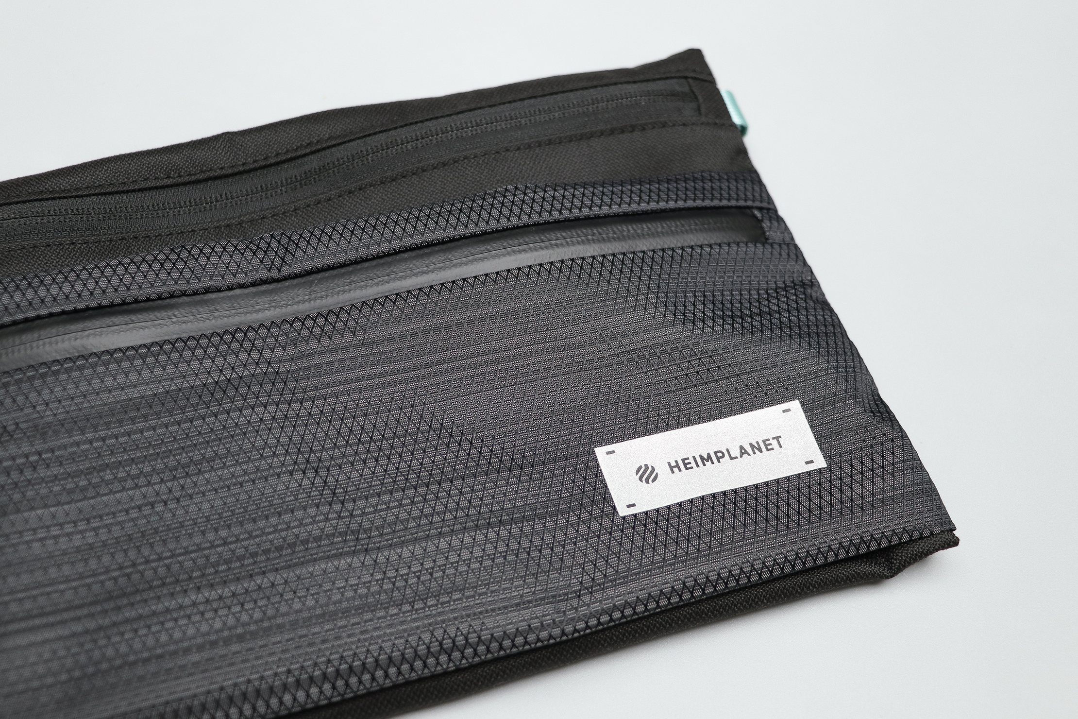 Heimplanet Neck Pouch A5 Material and Logo