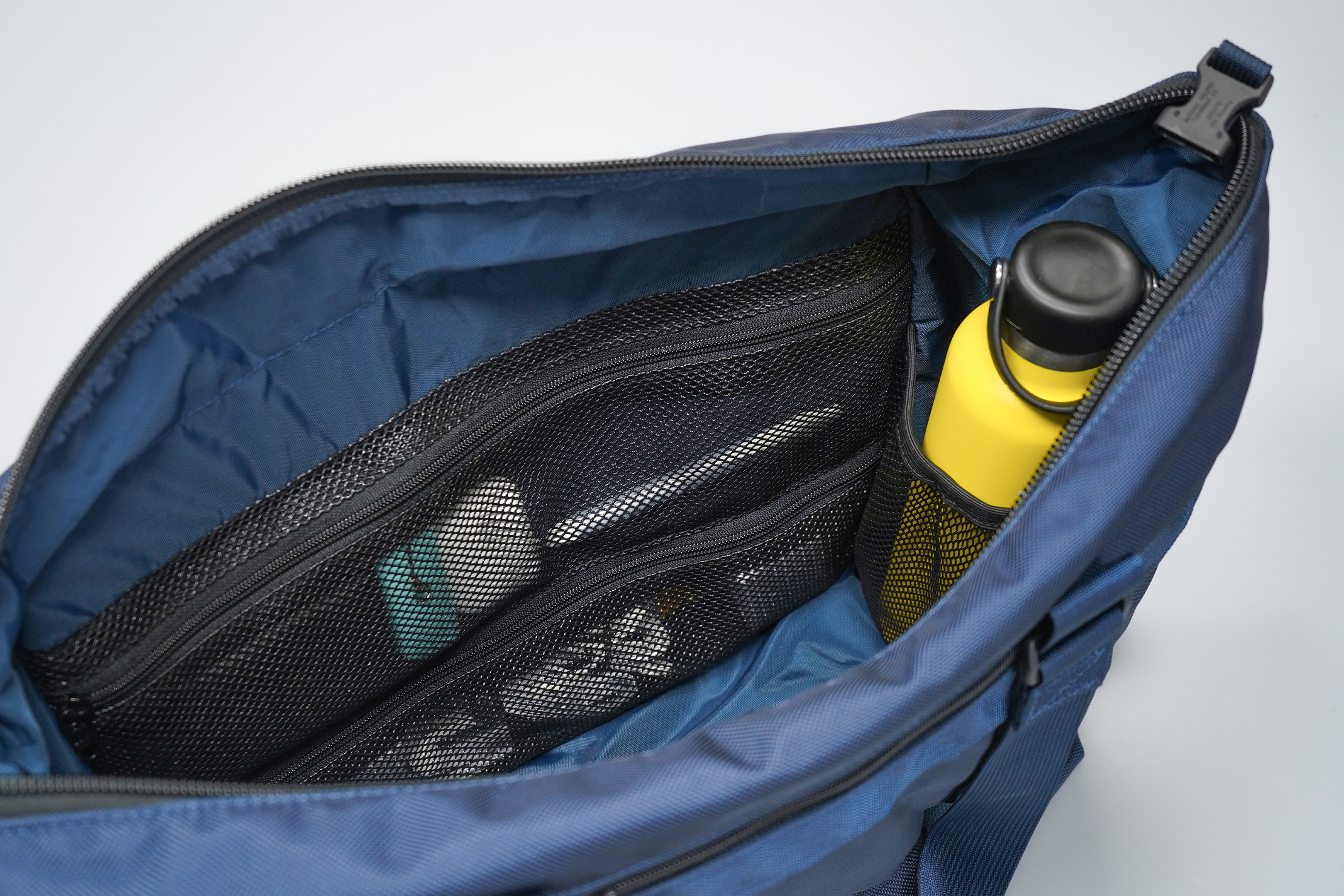 DSPTCH Utility Tote | Small items remain visible yet secure thanks to the mesh material