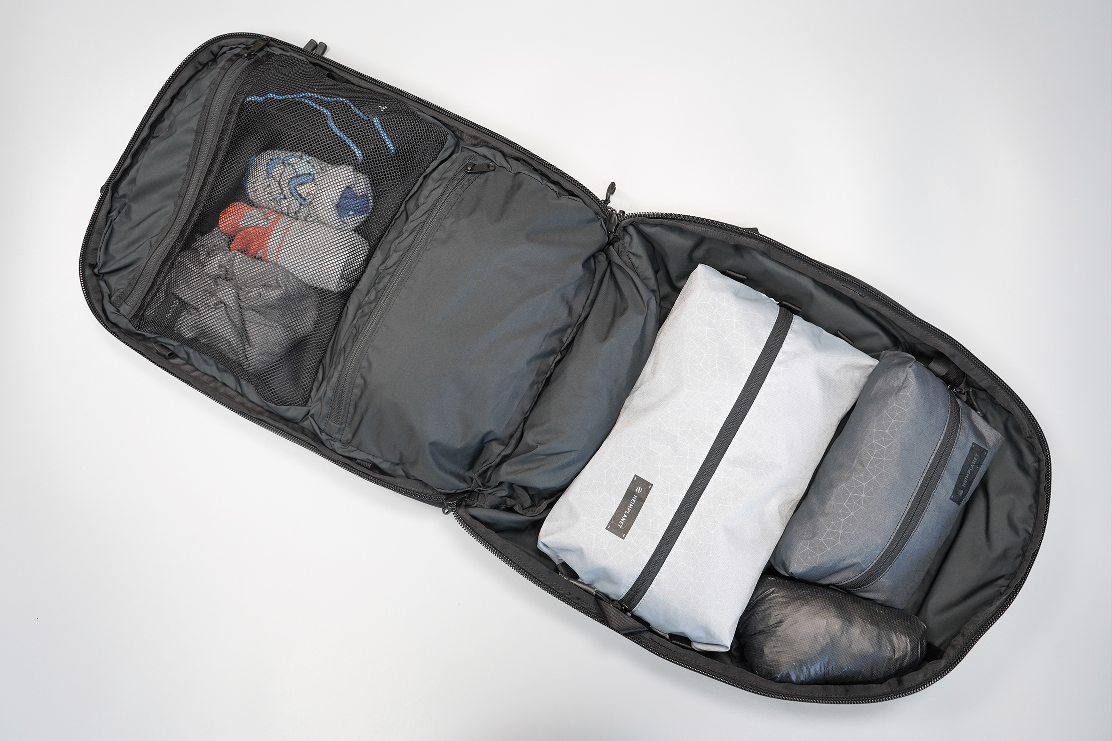 Minaal Carry-On 3.0 | Clamshell-style opening makes scooping up clothes easy