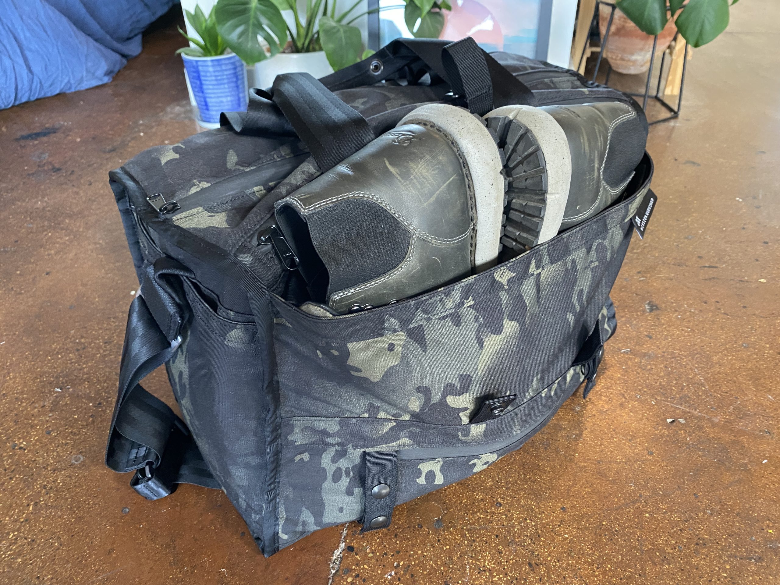 Mission Workshop Transit Duffle with boots in side pocket