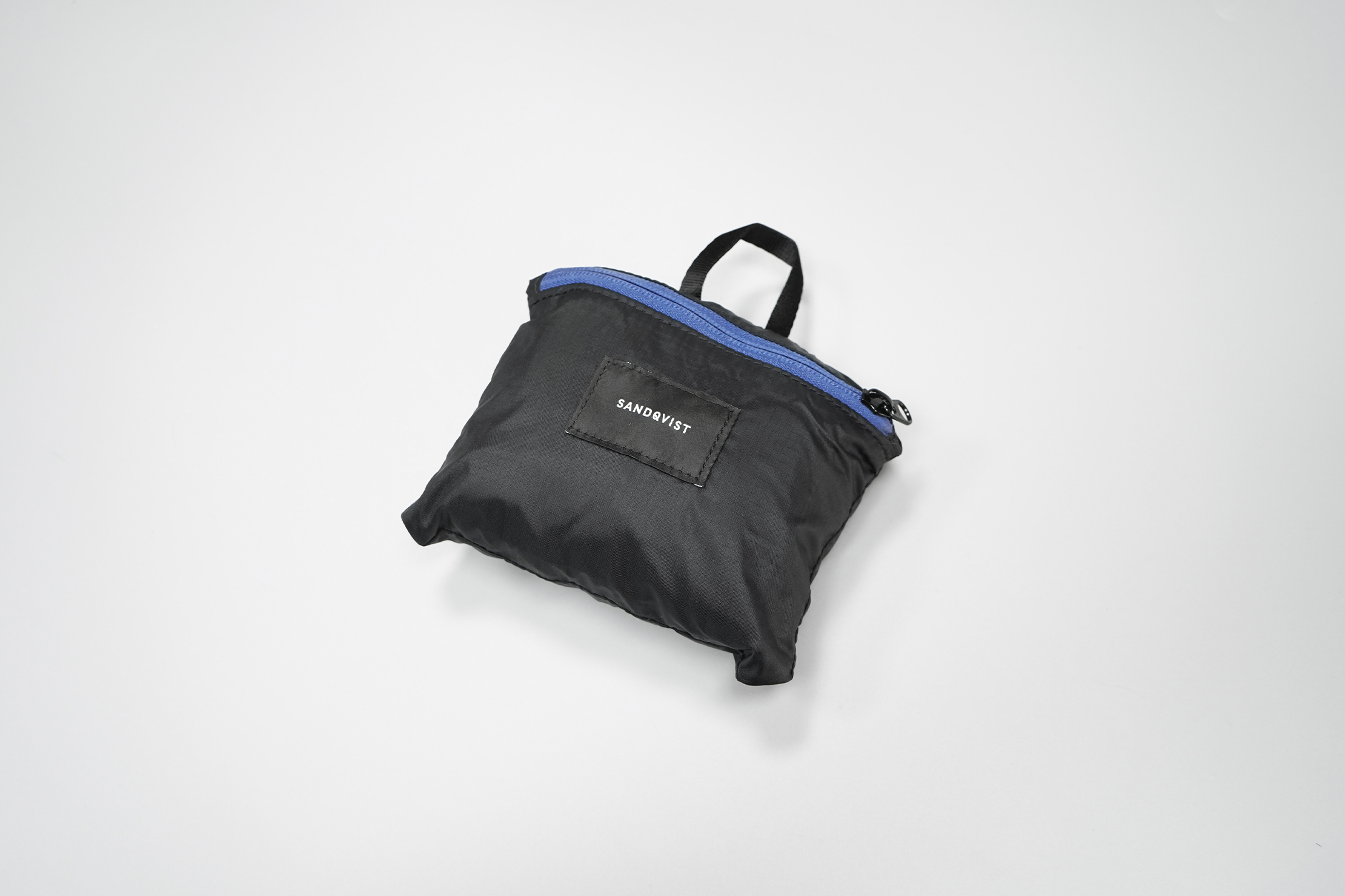 Sandqvist Erland Packable Ziptop Backpack | It compresses down to about half the size of a tech pouch