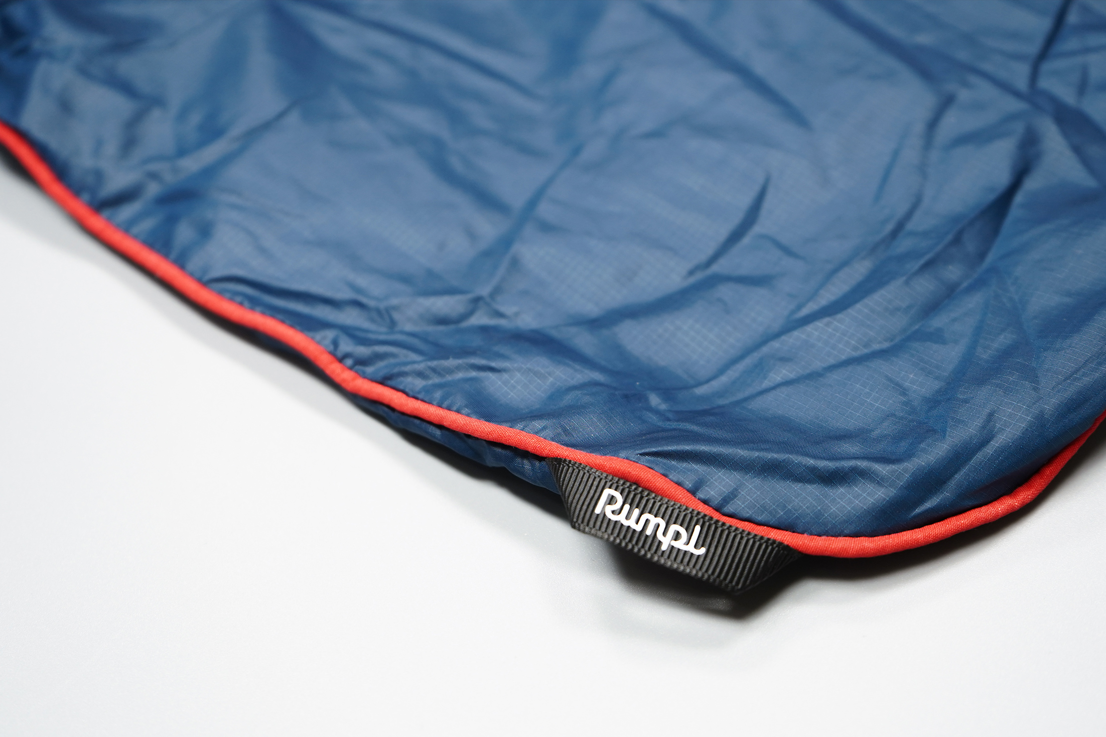 Rumpl NanoLoft Travel Blanket Material and Logo