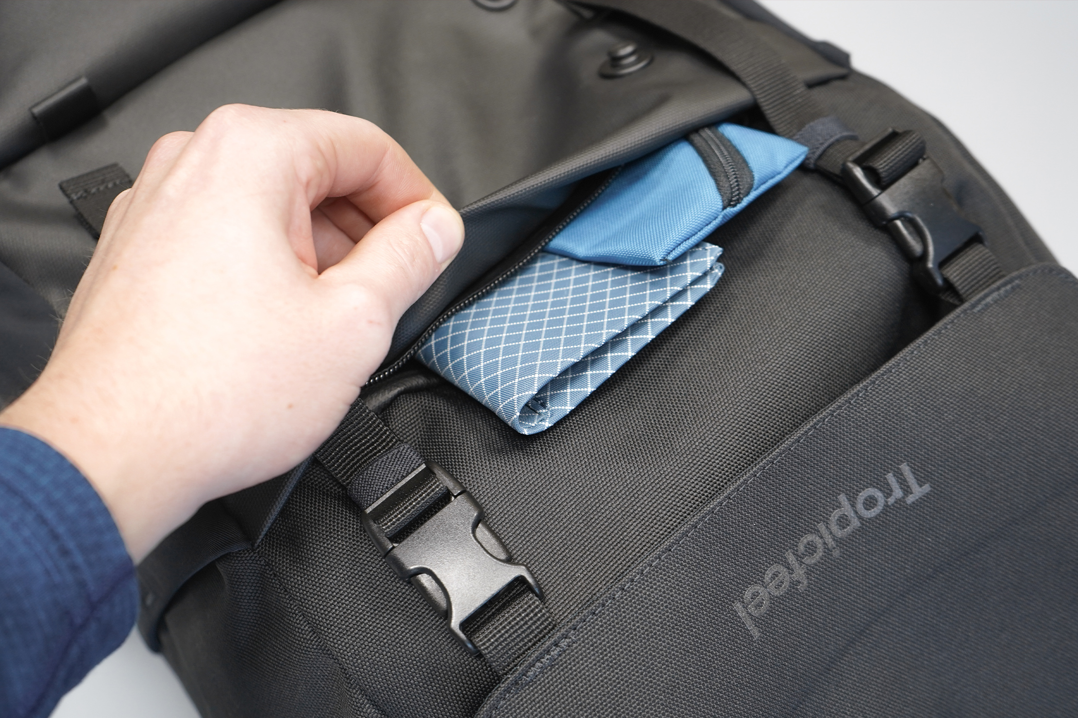 Tropicfeel Shell Travel Backpack | The shrouded front pocket is a nice security feature