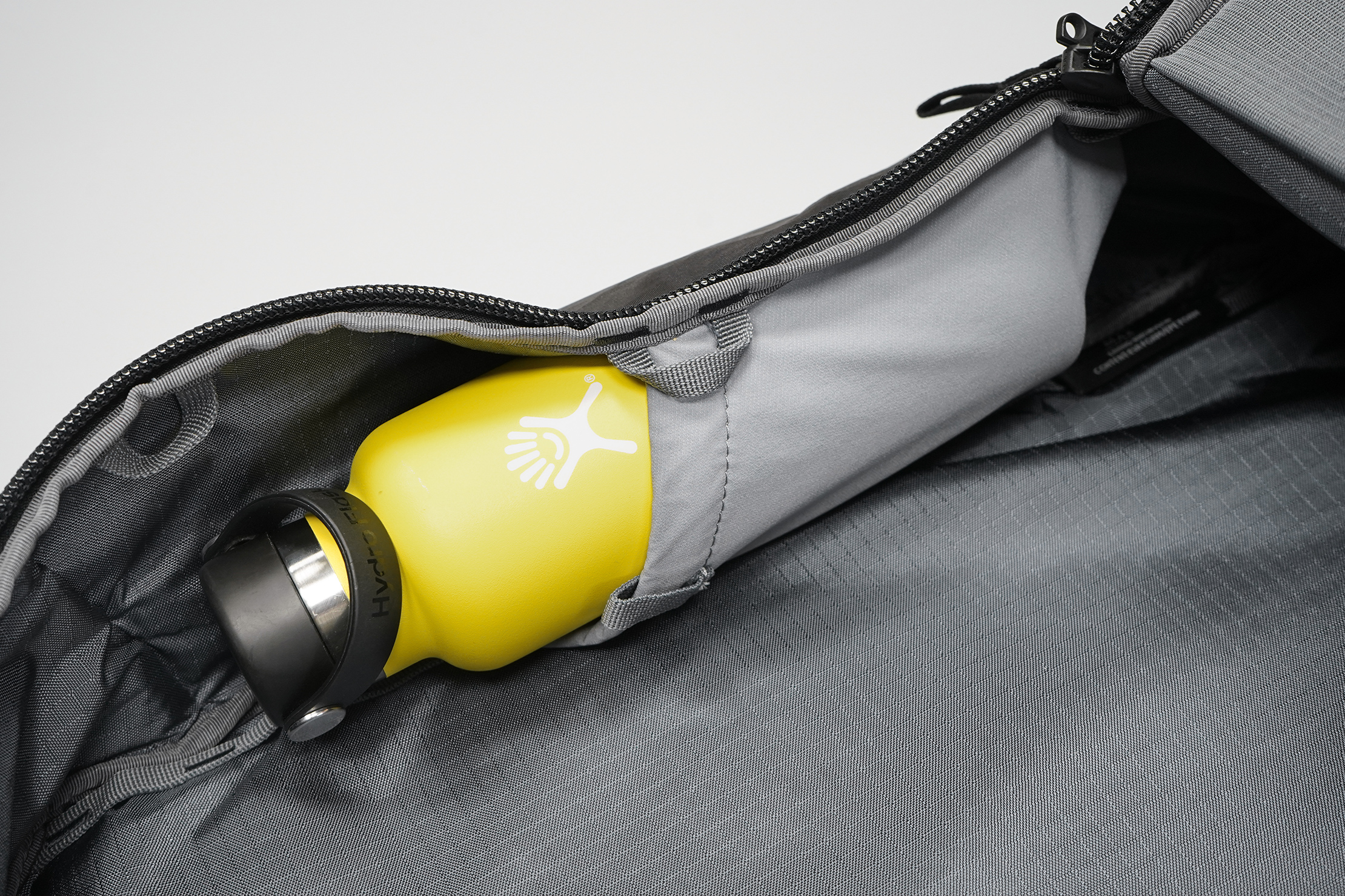 Backpack with internal 2025 water bottle holder