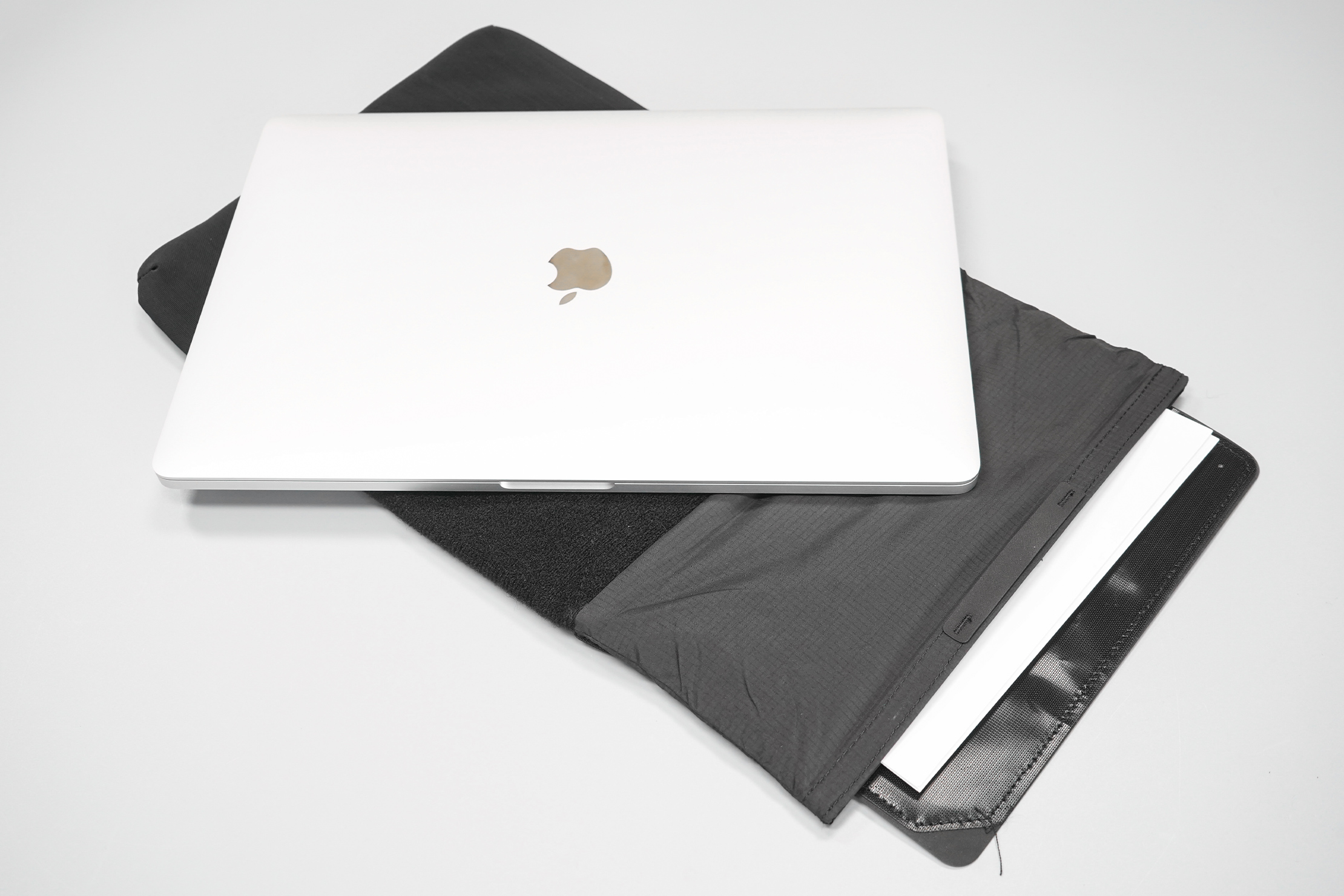 Matador Laptop Base Layer | The rolltop is adjustable to fit long items.