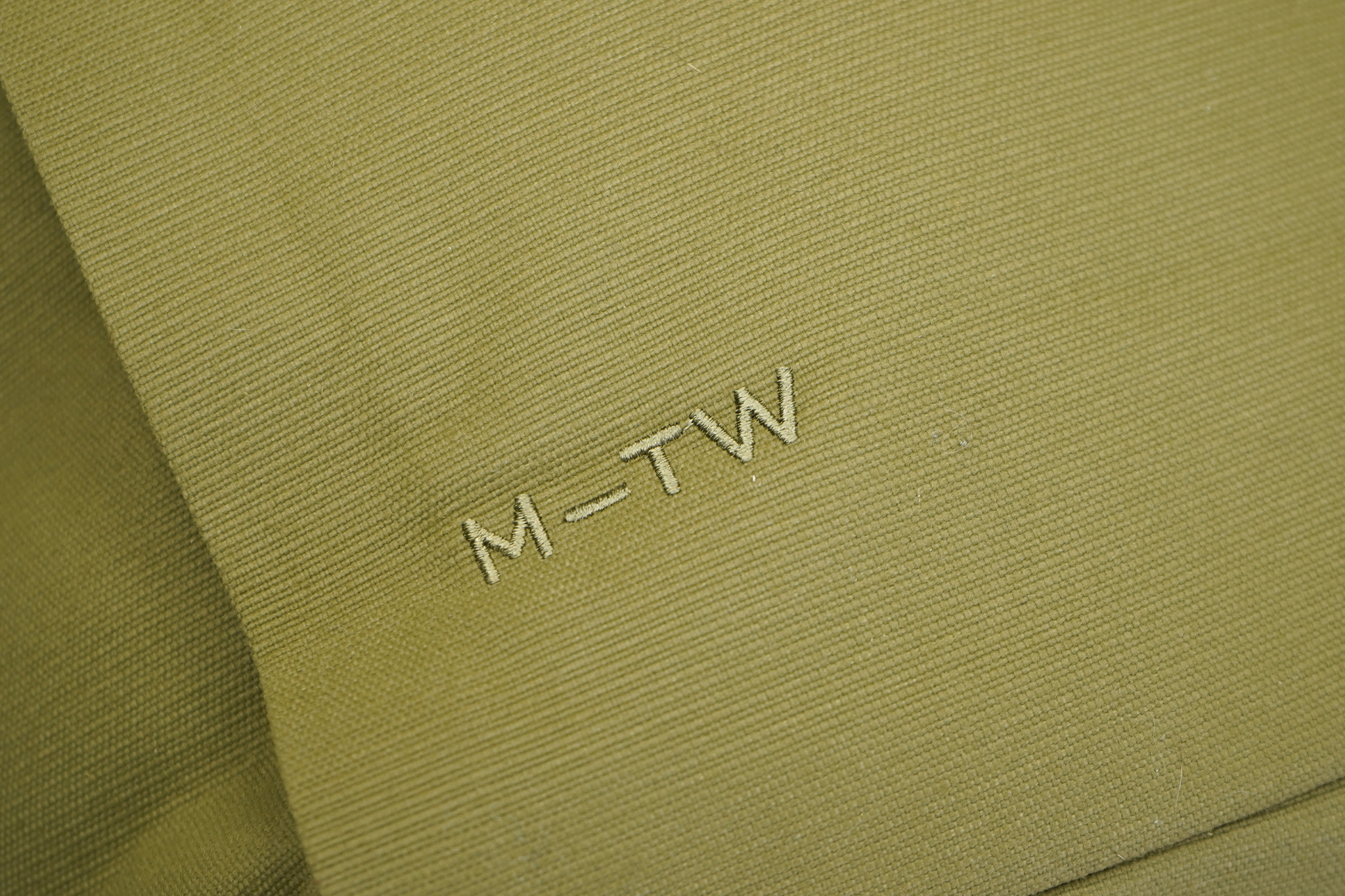 Moment MTW Backpack | Logo and fabric