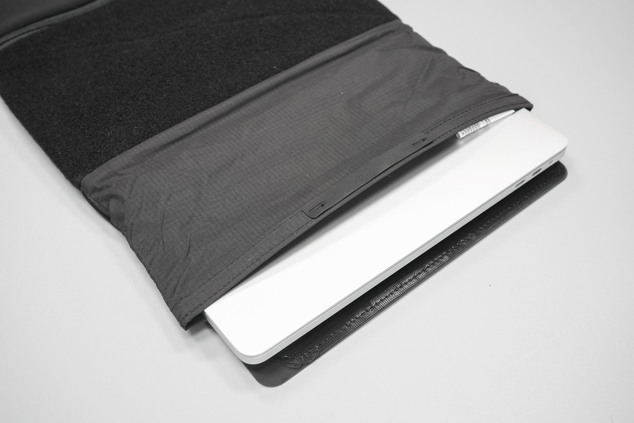Matador Laptop Base Layer | Taking out our laptop from the rolltop.