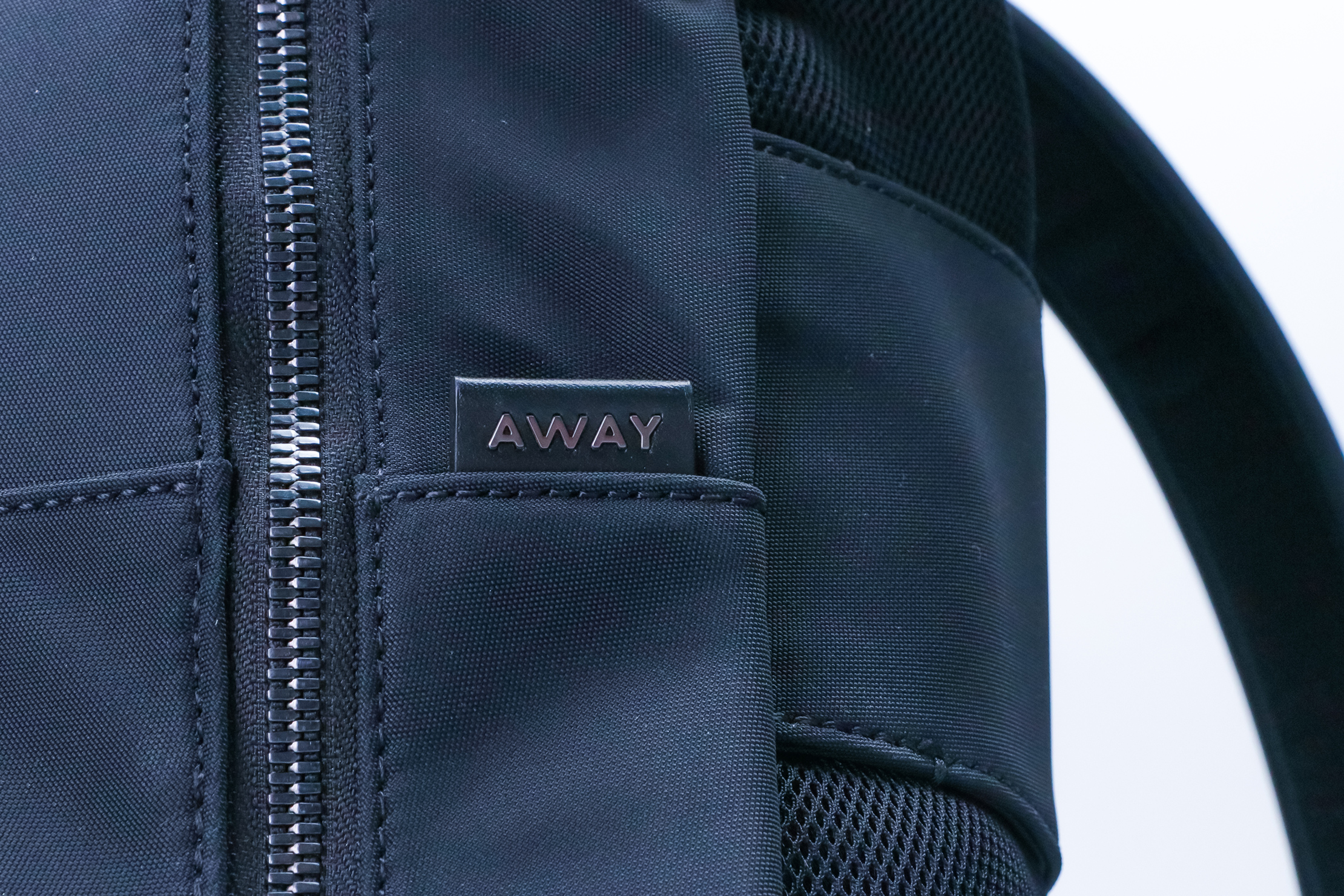 Away Small Zip Backpack Logo