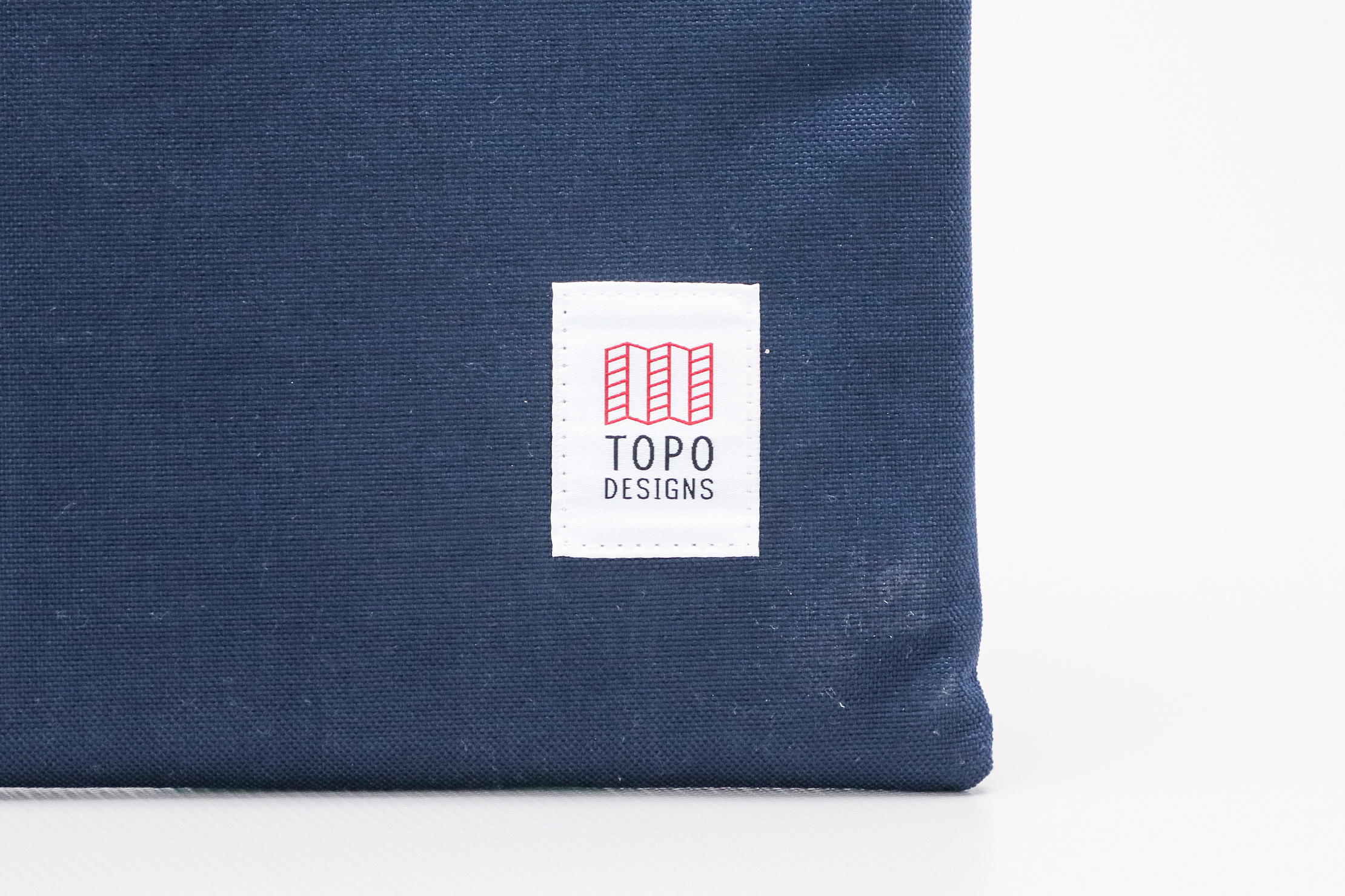 Topo Designs Laptop Sleeve Logo Closeup