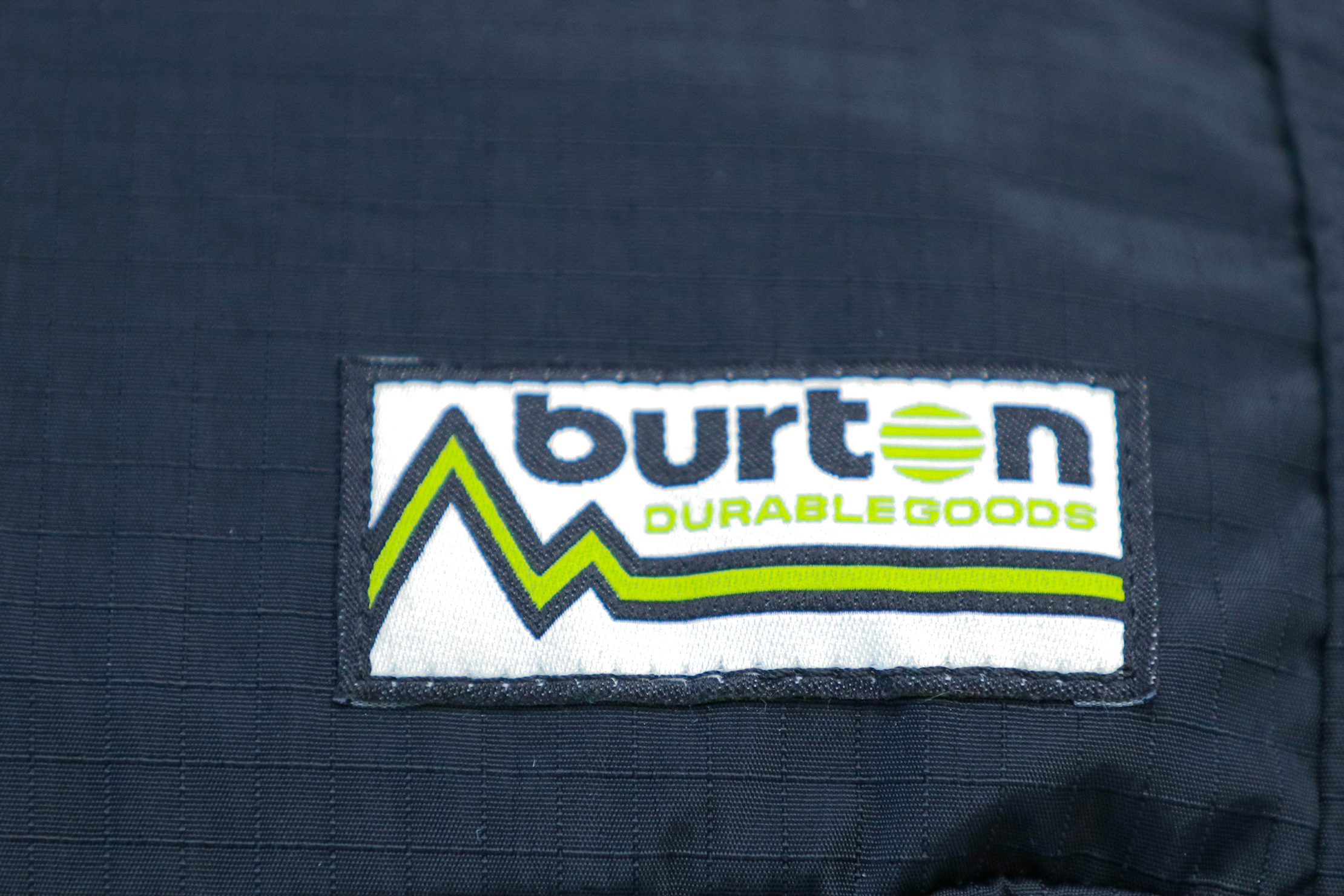 Burton Sleyton 18L Packable Hip Pack brand label and materials