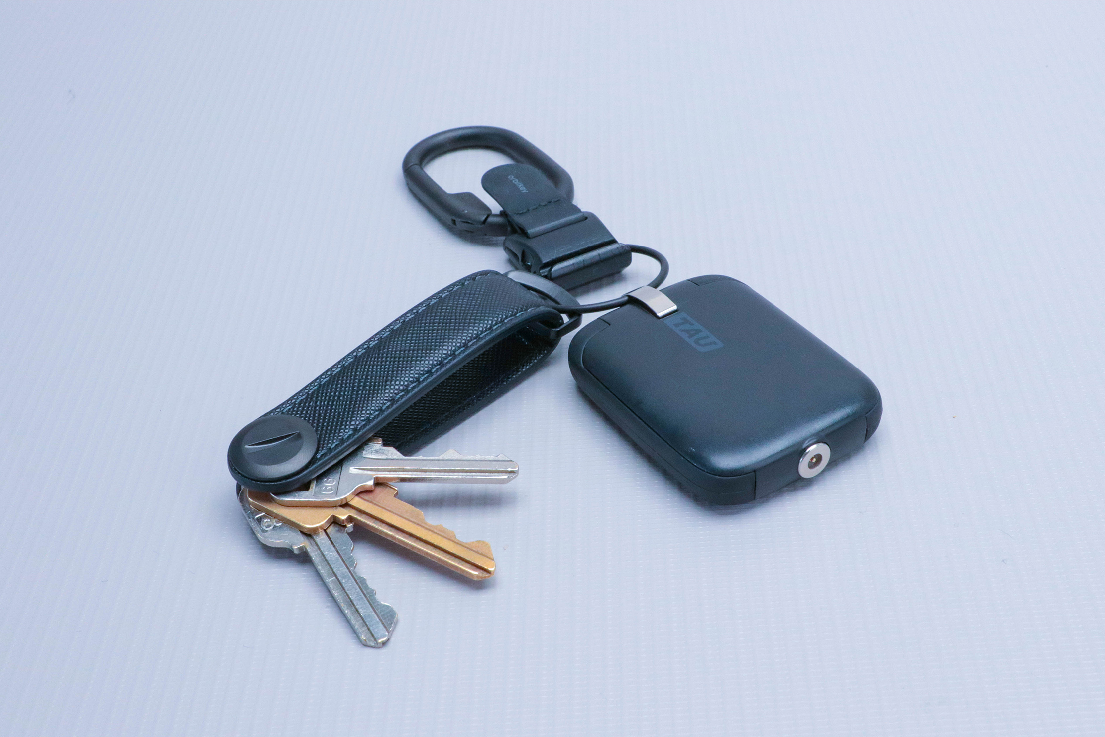 https://cdn.packhacker.com/2021/10/df2c75eb-rolling-square-tau-keychain-2.jpg