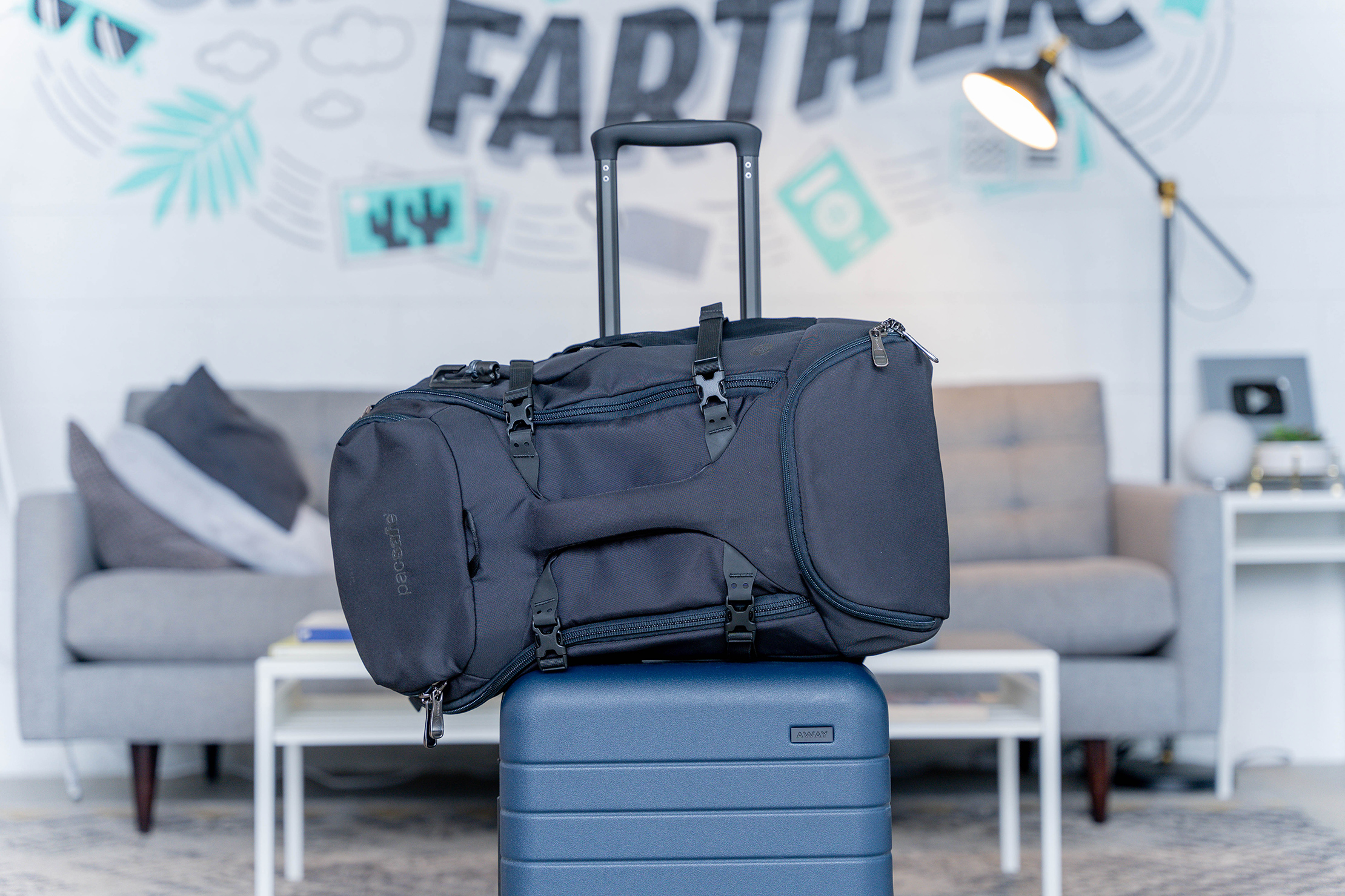 Pacsafe Venturesafe EXP35 Travel Backpack On Suitcase