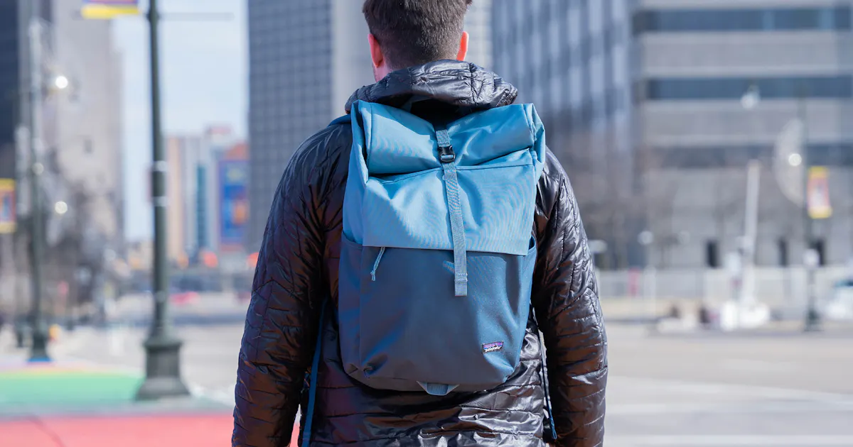 patagonia rolltop bag Fieldsmith Roll-Top Pack Worn Wear and right Patagonia Arbor Roll Top Pack