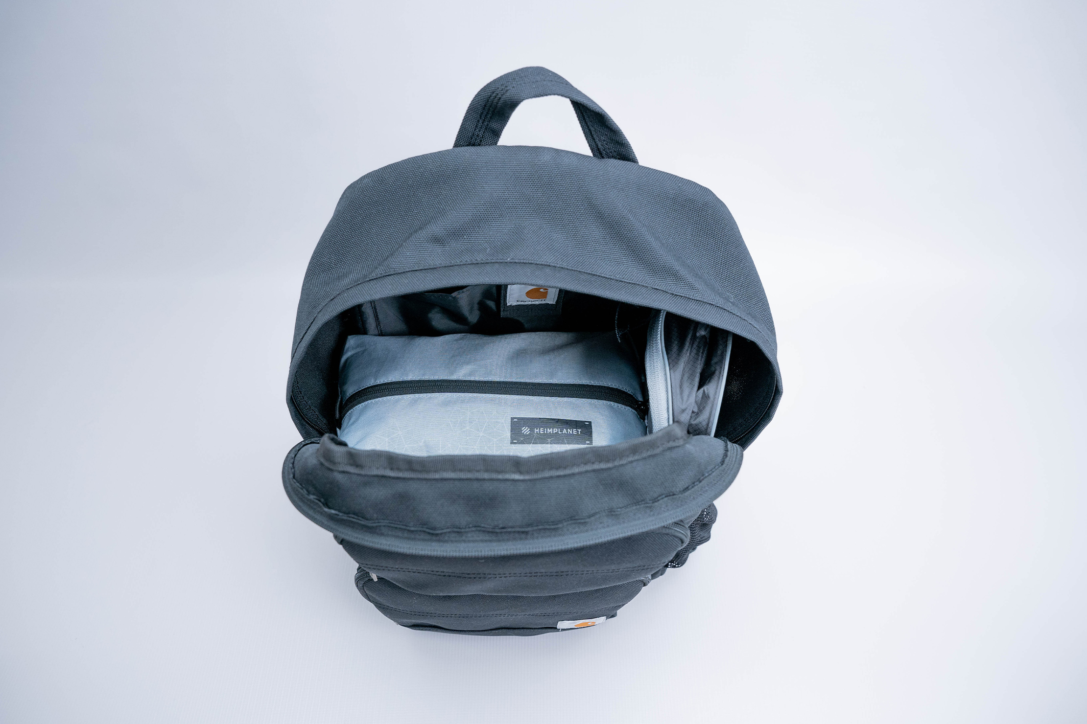 Single compartment outlet backpack