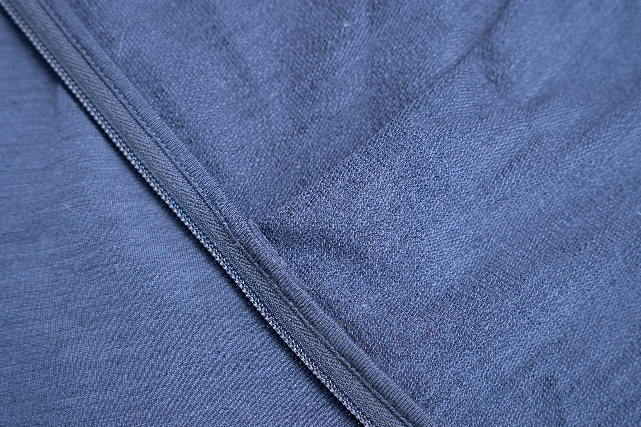 Unbound Merino Compact Travel Hoodie Material