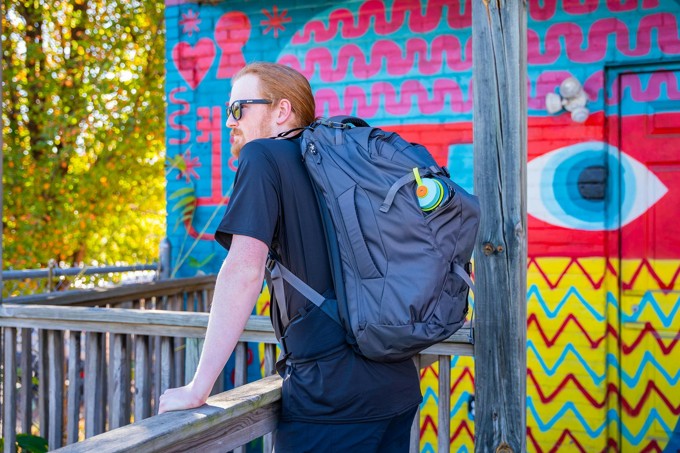 A Guide to Choosing The Best Travel Insurance Standing With Backpack