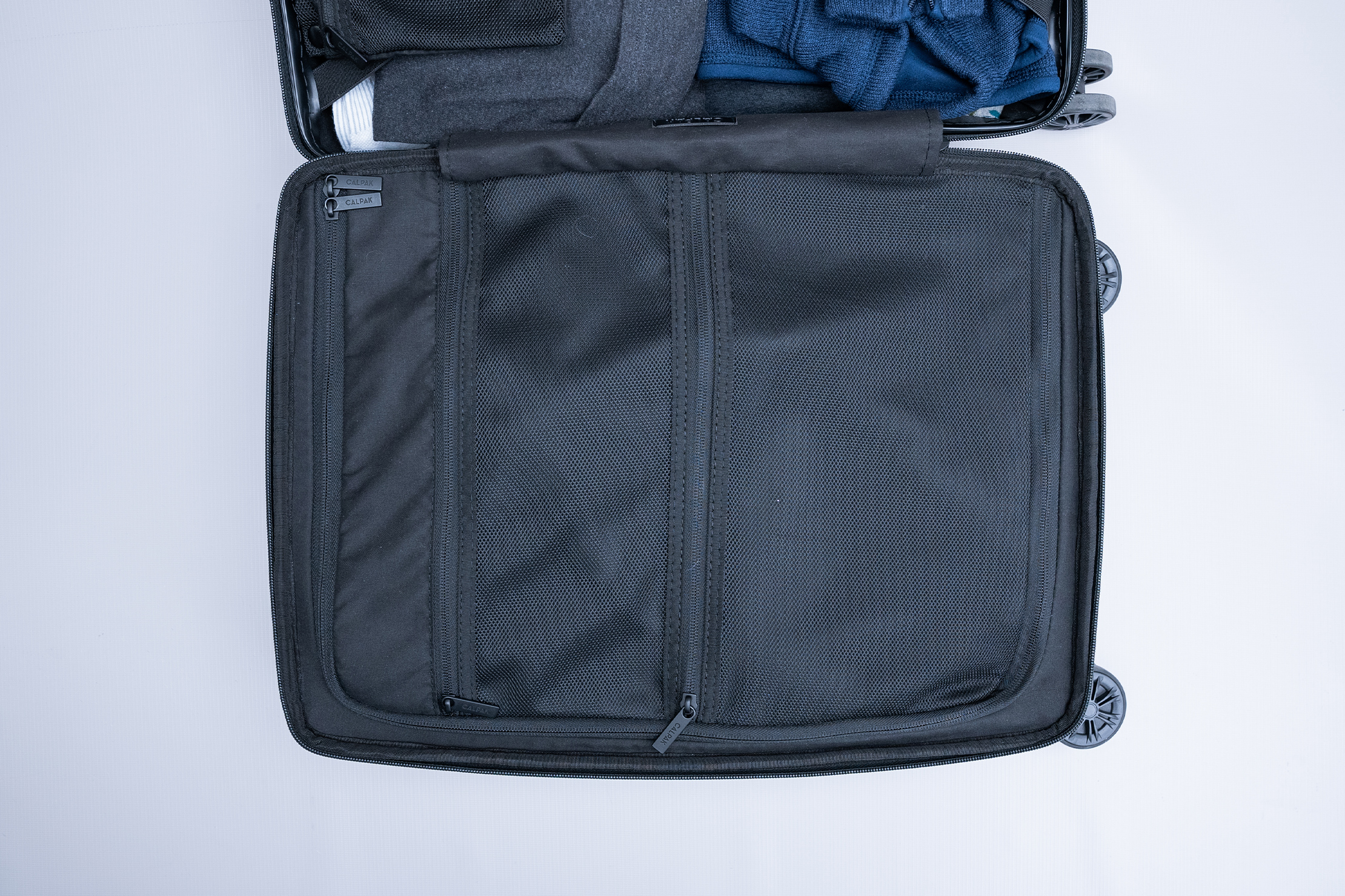 Calpak Ambeur Carry-On Luggage Zippered Side