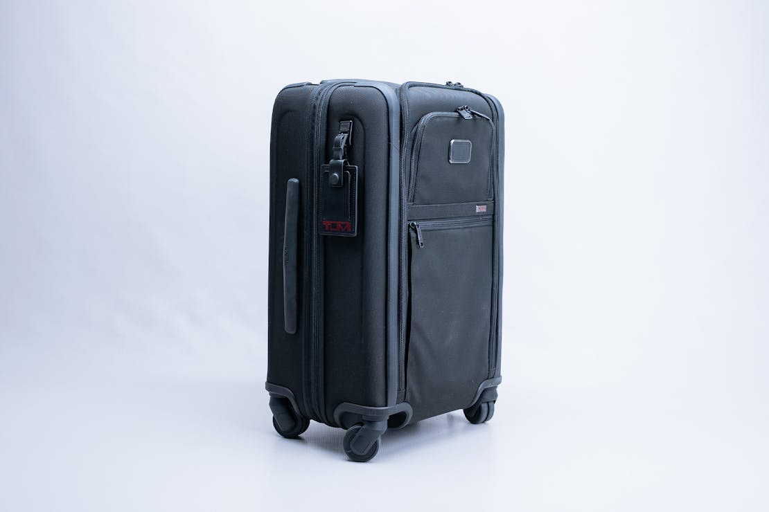 TUMI Alpha International Expandable 4 Wheeled Carry-On