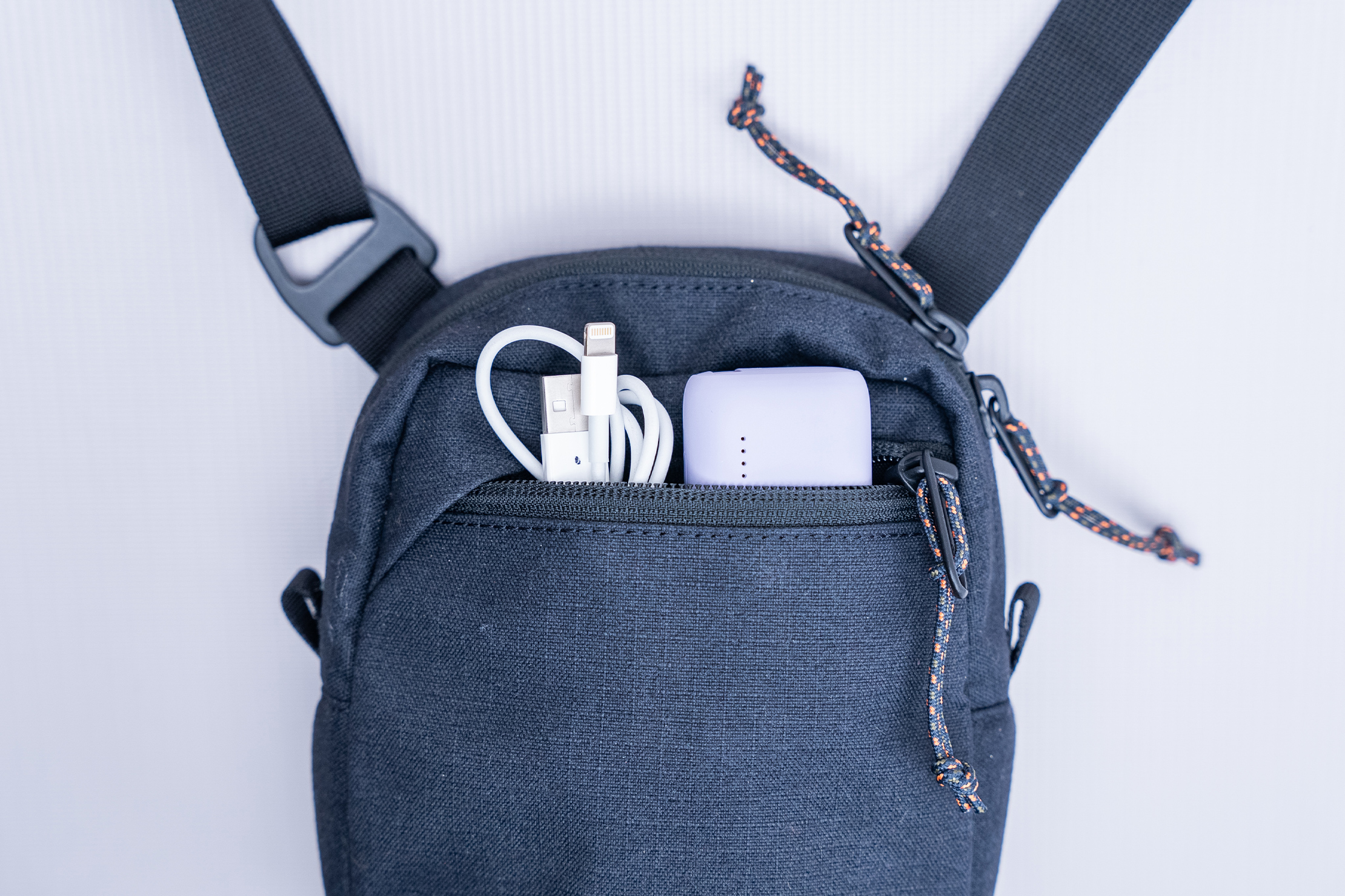 Finisterre Nautilus Pocket Pack Bag Front Pocket In Use