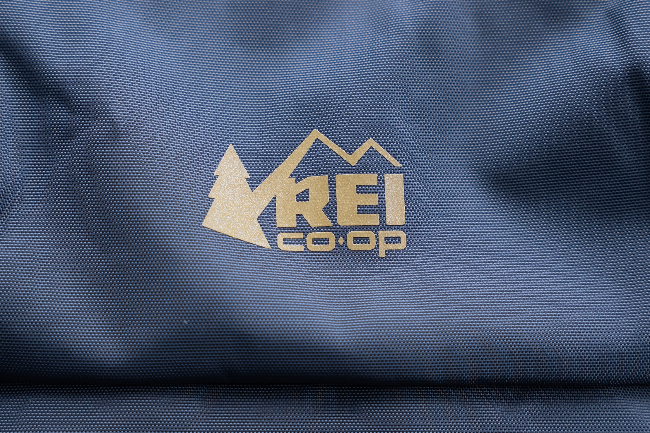 REI Co-op Commuter Pack Logo