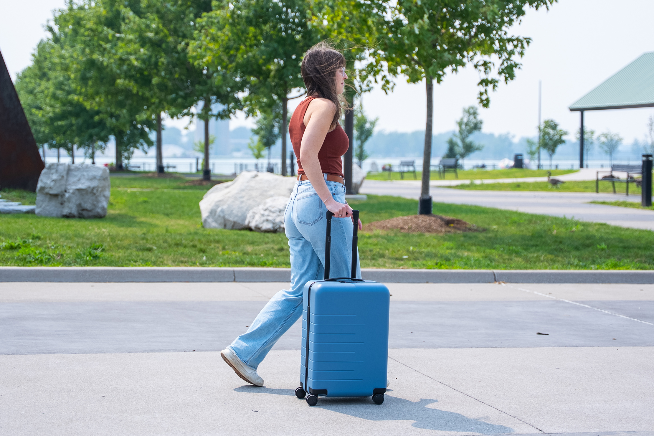 Quince Carry-On Suitcase (21 in) Walking 2