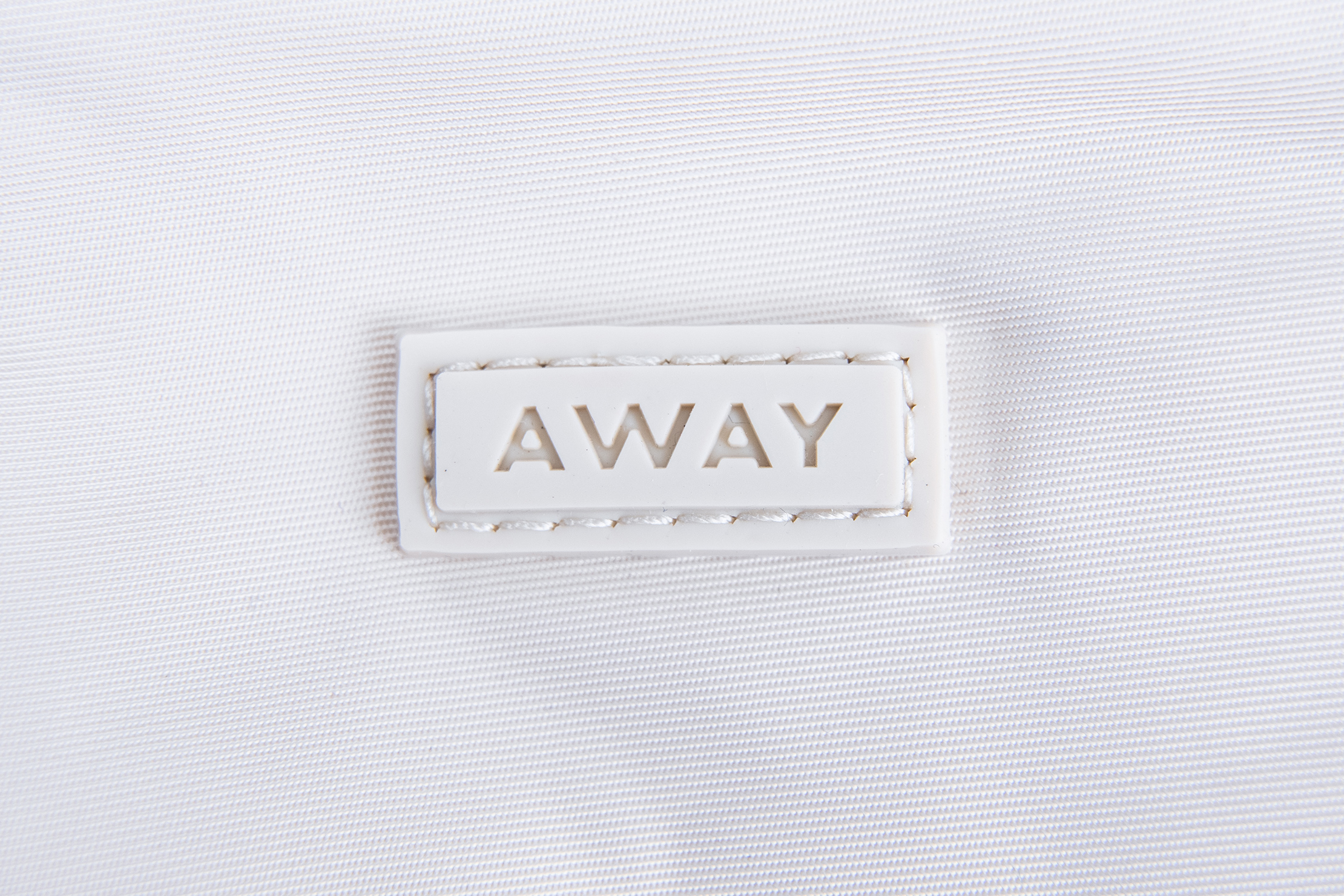 Away Featherlight Crossbody Brand