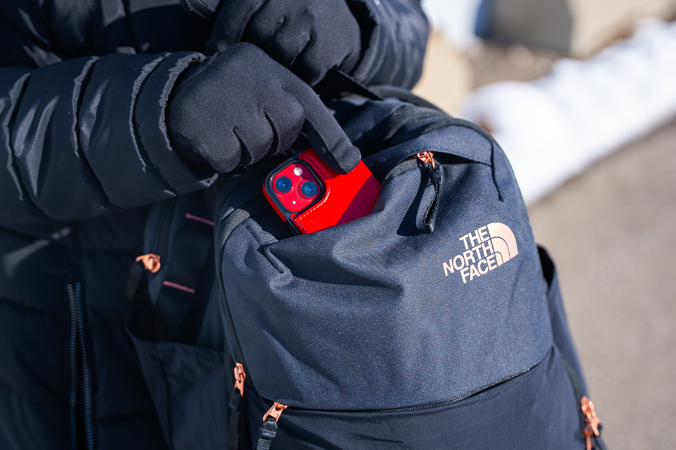 The North Face Isabella Transit Backpack Phone in Use