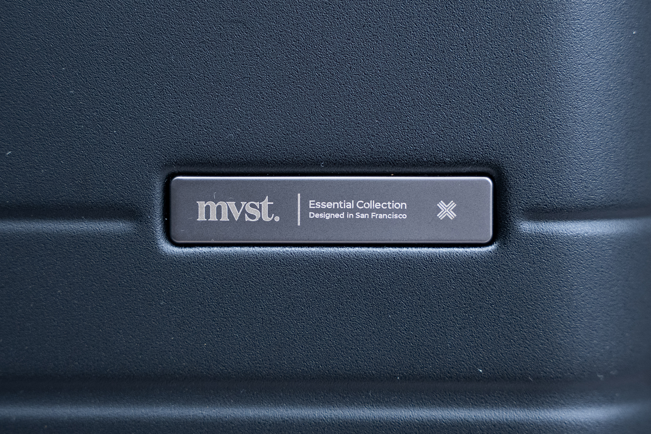 MVST Select Essential Collection Suitcase (Carry-On) Logo
