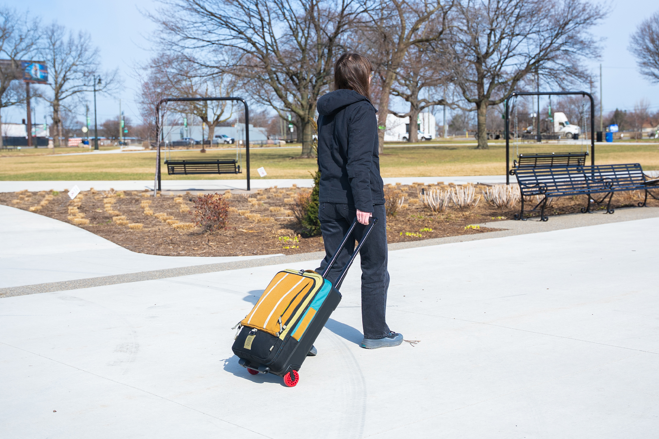 Topo Designs Global Travel Bag Roller Walking